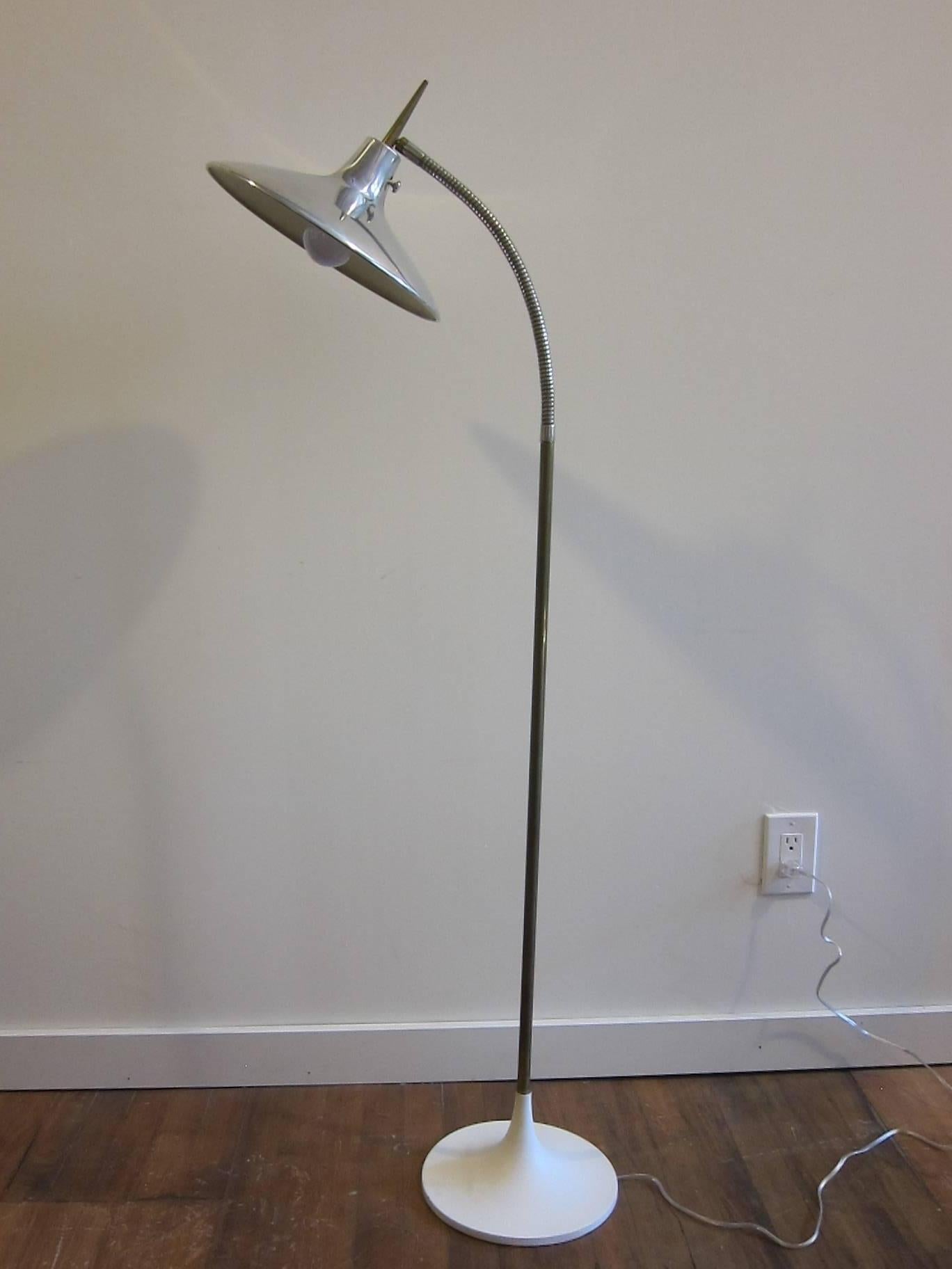 Laurel Floor lamp in the style of  Gio Ponti, model B-683 floor lamp. White base with brass pole, chrome flexible goose neck with chrome shade and brass handle. 
Very good condition. Newly wired.