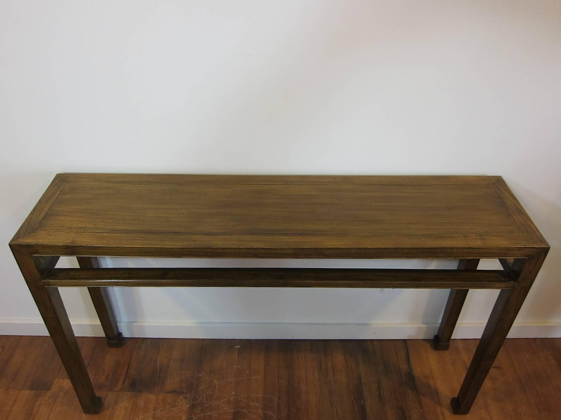 Window pane strutted elm wood console table. Solid Elm wood with legs terminating to block feet. The struts are used to create a window pane effect around the table.   A gorgeous table,  fantastic value and price.  This table has refinement and