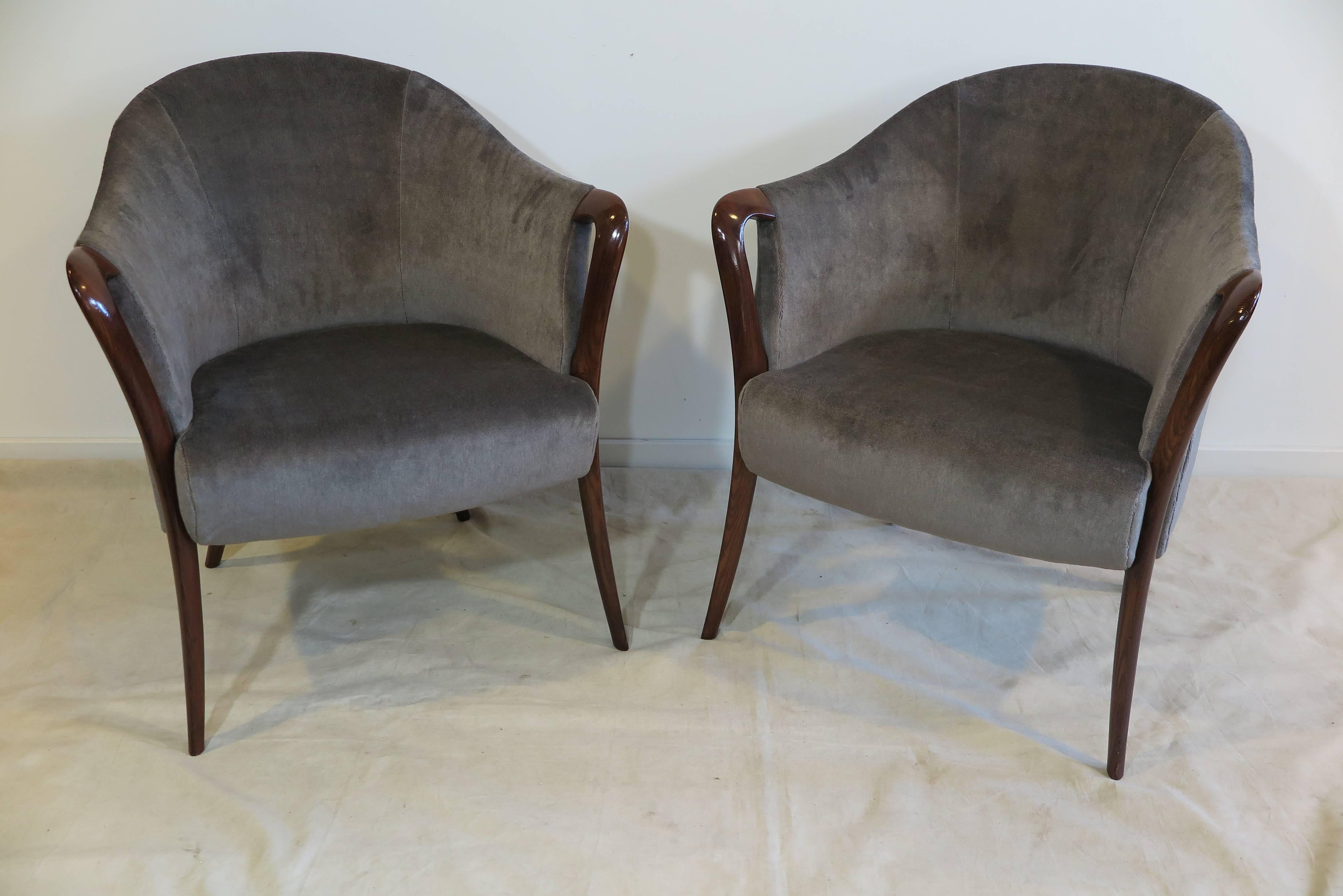 A pair of Art Deco round back armchairs in mohair.
