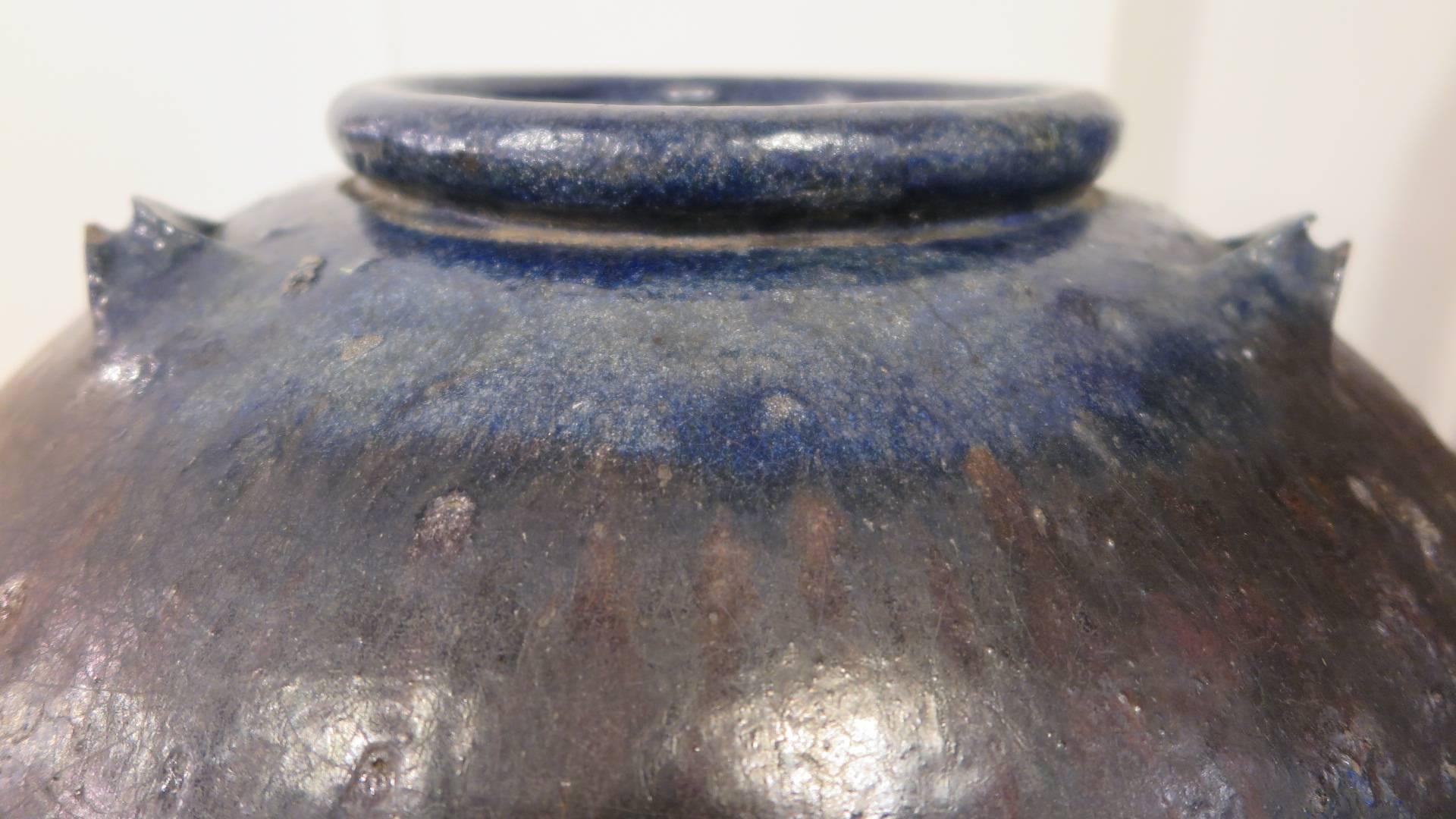 A Burmese stoneware water jar. This is a large stoneware piece, can be used indoors or outdoors. Can also be used as a fountain > the picture of the fountain is of a similar jar that we sold and customized into the fountain pictured.  Heavy about