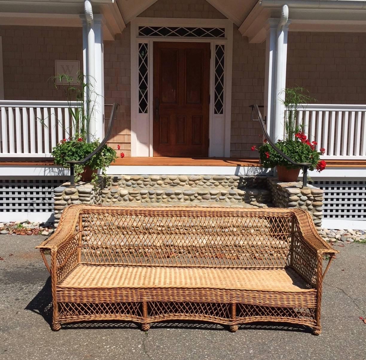 Beautiful and rare original finish Bar Harbor wicker sofa woven of willow by the Whip-O-Willow Company of Scranton, Pennsylvania from the early 1900s.