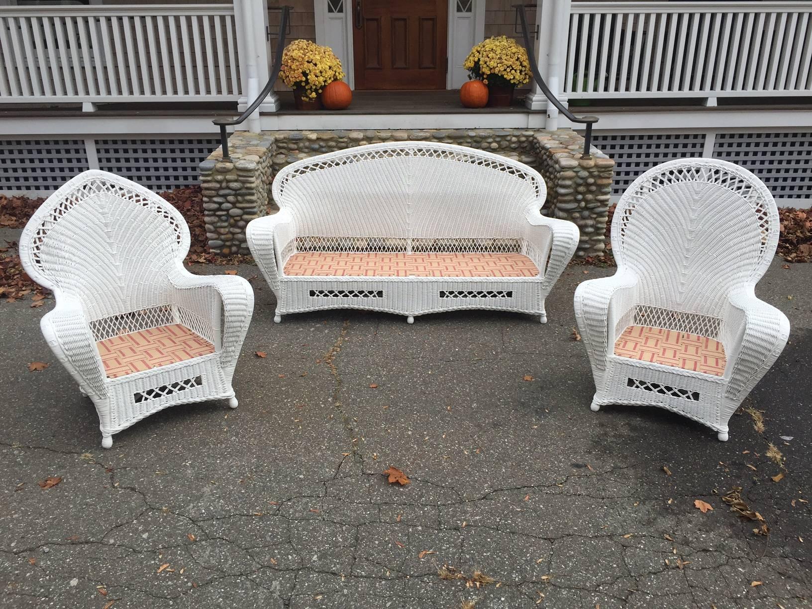 Antique Art Deco Wicker Parlor Set in fresh white paint.  Seating is large in scale and generously proportioned providing a comfortable feel.

Sofa measures 78