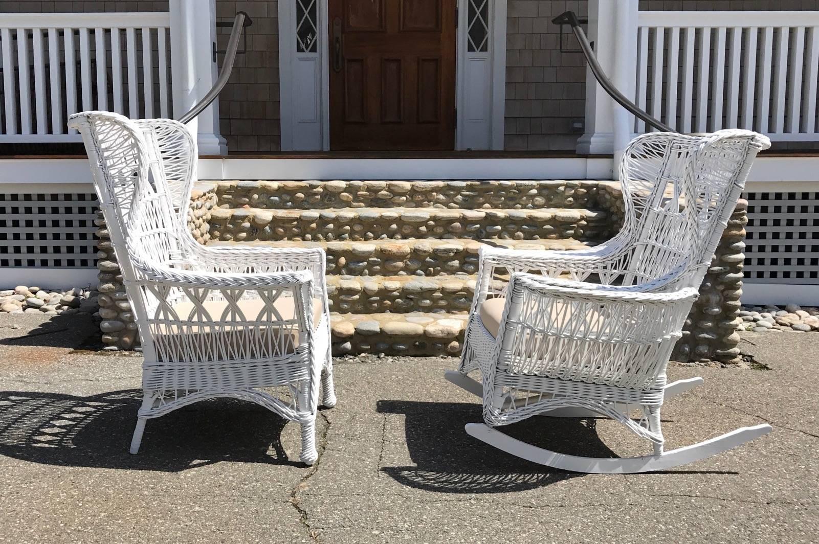 Antique wicker chair and rocker in desirable triple cross pattern woven of reed to a hardwood frame. One seat is woven and the other is a spring base.