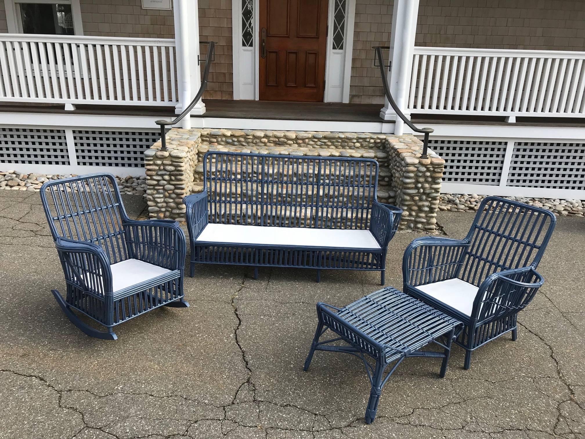 Antique stick wicker set made of rattan and freshly painted a marine blue. This set includes a rocker as well as a chair which is unusual for antique stick sets. Moderate in scale and comfortably built.
Measures: Sofa 72 wide, 35.5 tall, 30 deep,