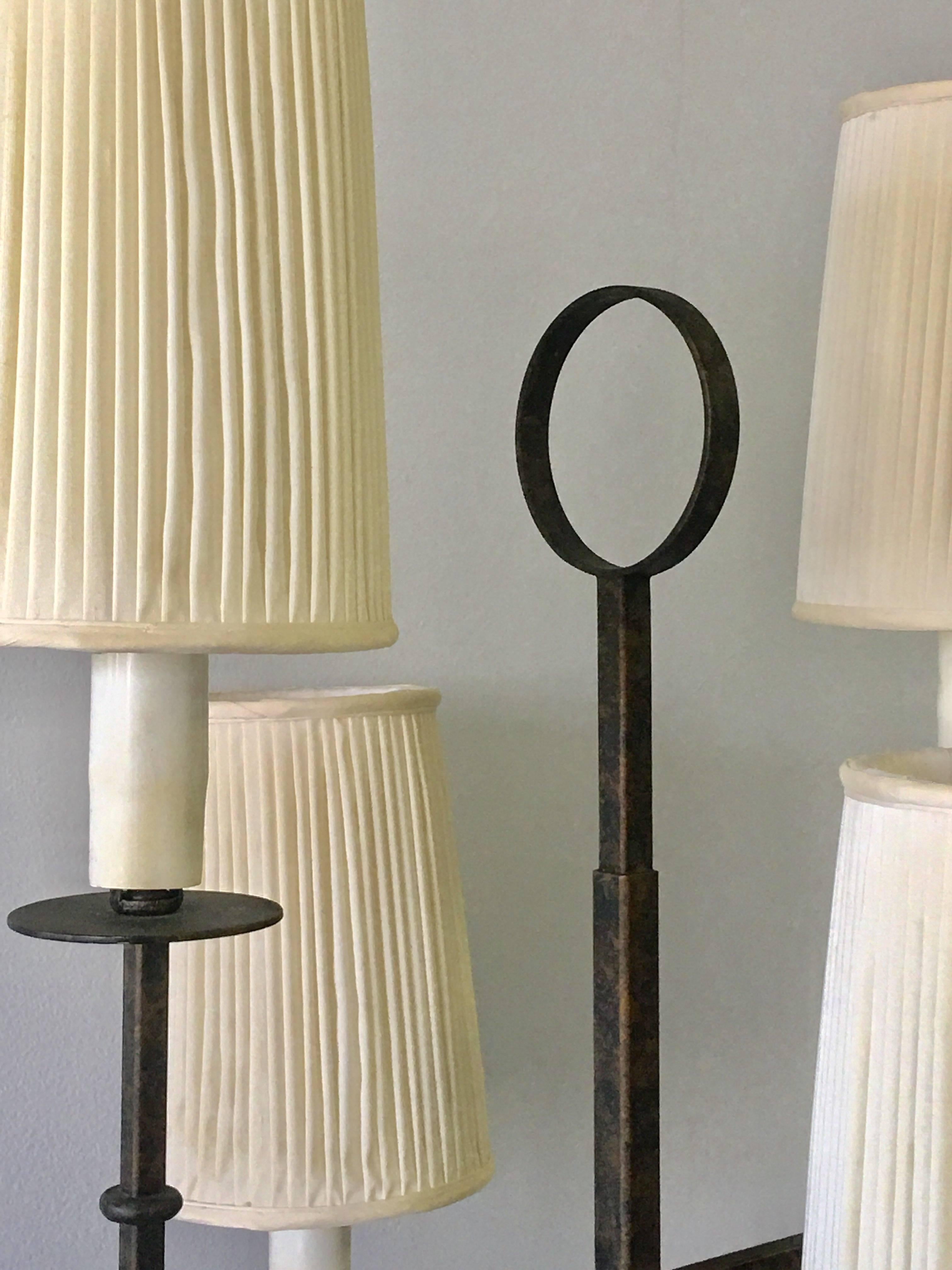 Exquisite floor lamp by Tommi Parzinger. Retains the original finish and shades. Four arms, each arm takes a regular bulb. Including the shades the floor lamp measures 18