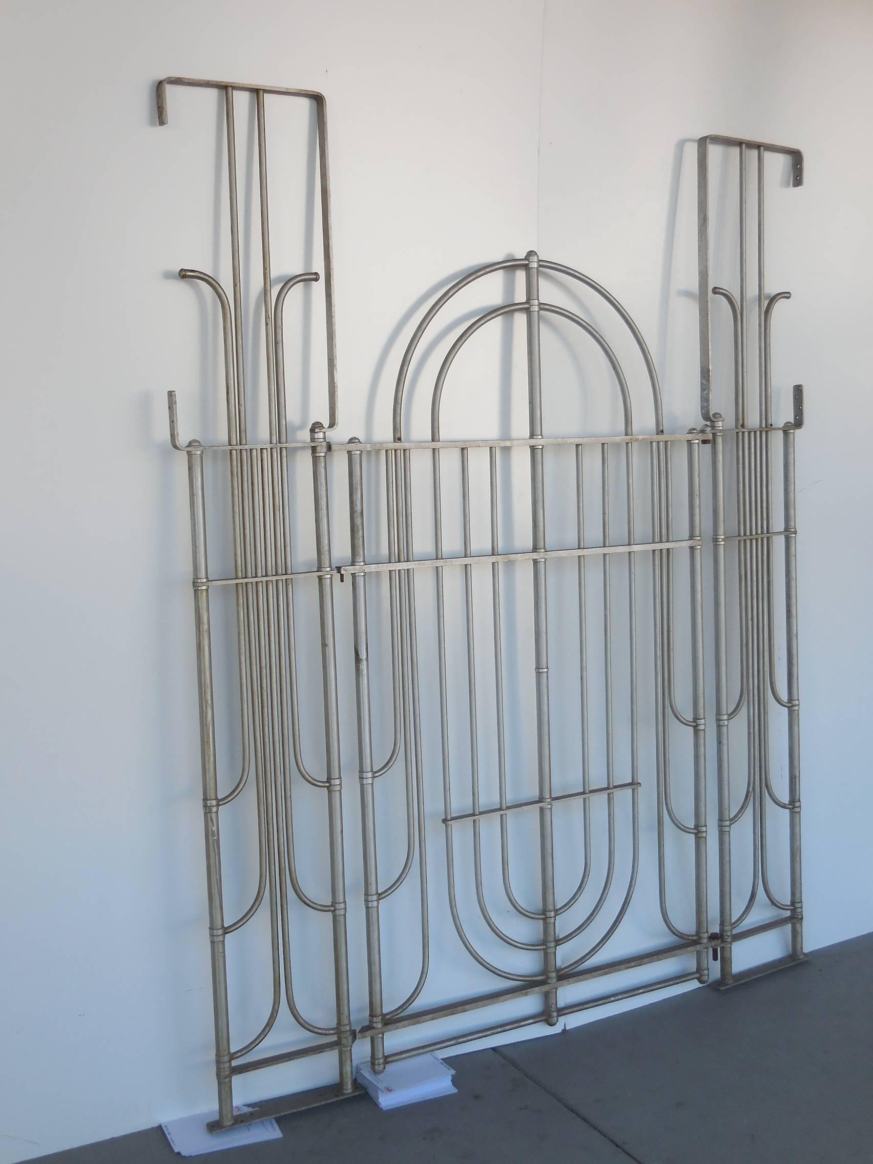 Extraordinary and rare Art Deco gate by Warren McArthur. This is a three part gate, aluminum construction.