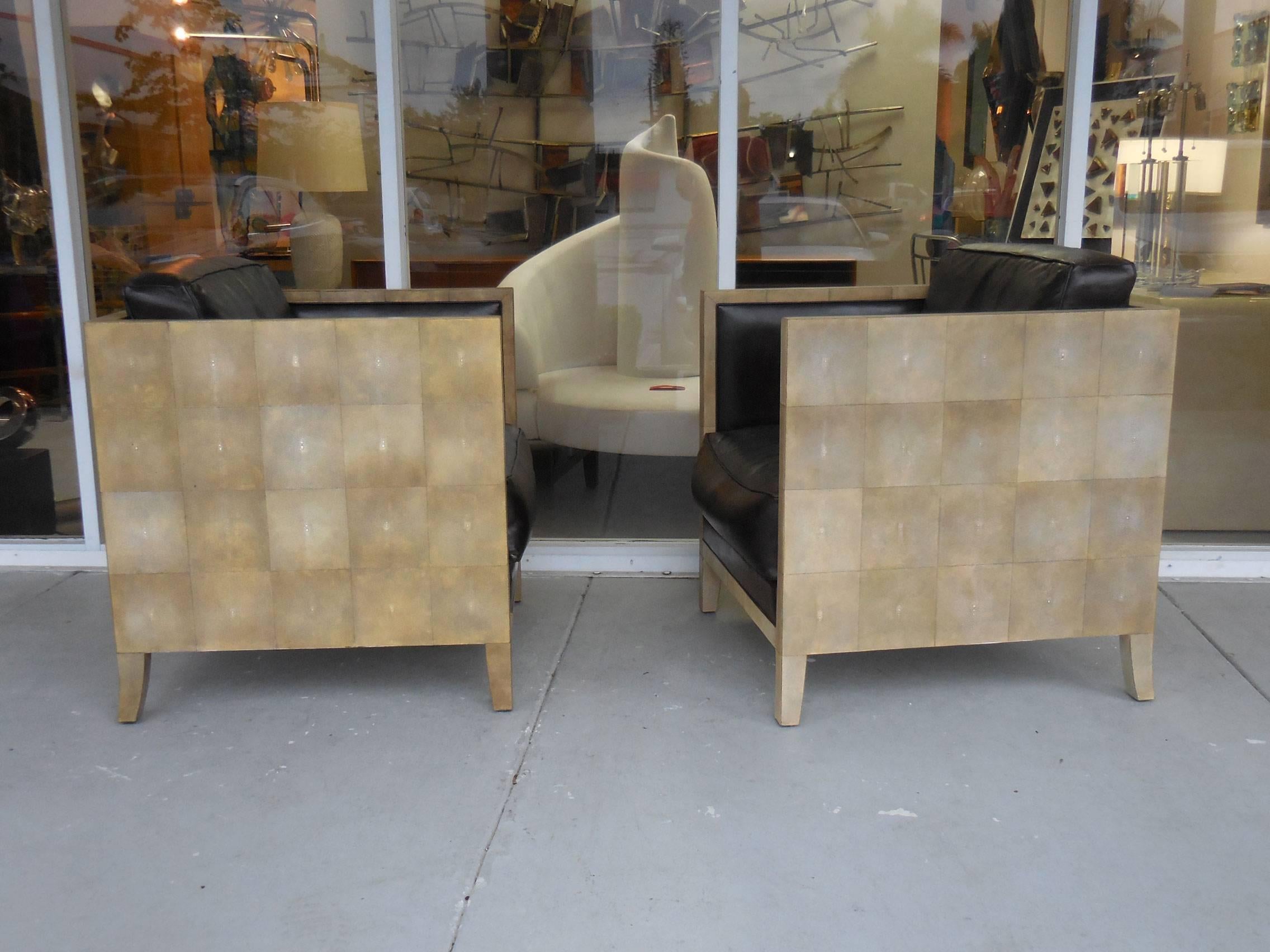 A pair of vintage shagreen and leather chairs in the style of Jean-Michel Frank. Nicely proportioned and stunning from any view.