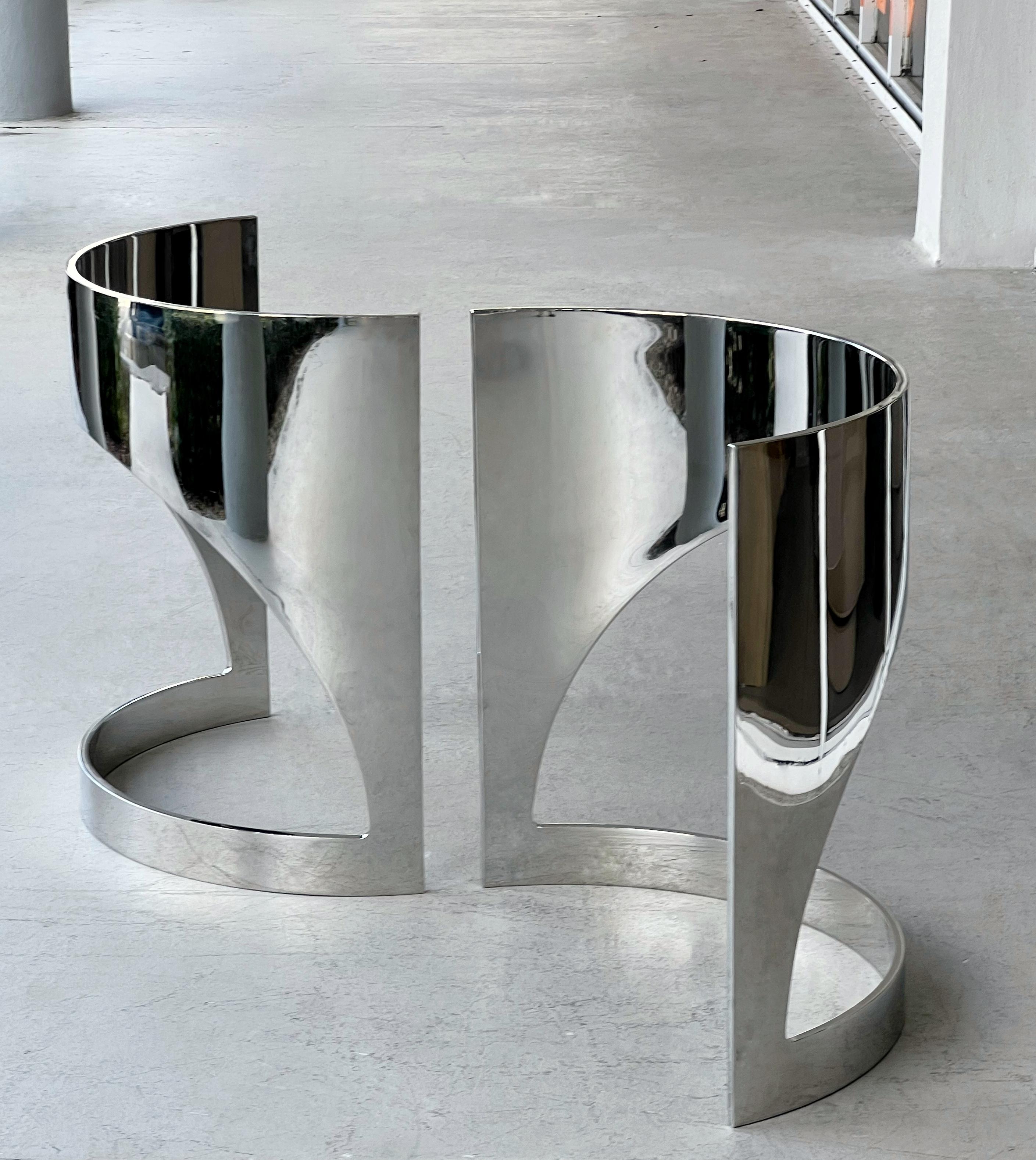 Spectacular stainless steel bases. Radial design with arch cutouts. Could be used for dining or conference table as well as consoles. 