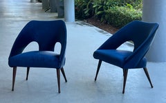 Pair Italian Mid Century Lounge Chairs with Pierced Arched Backs