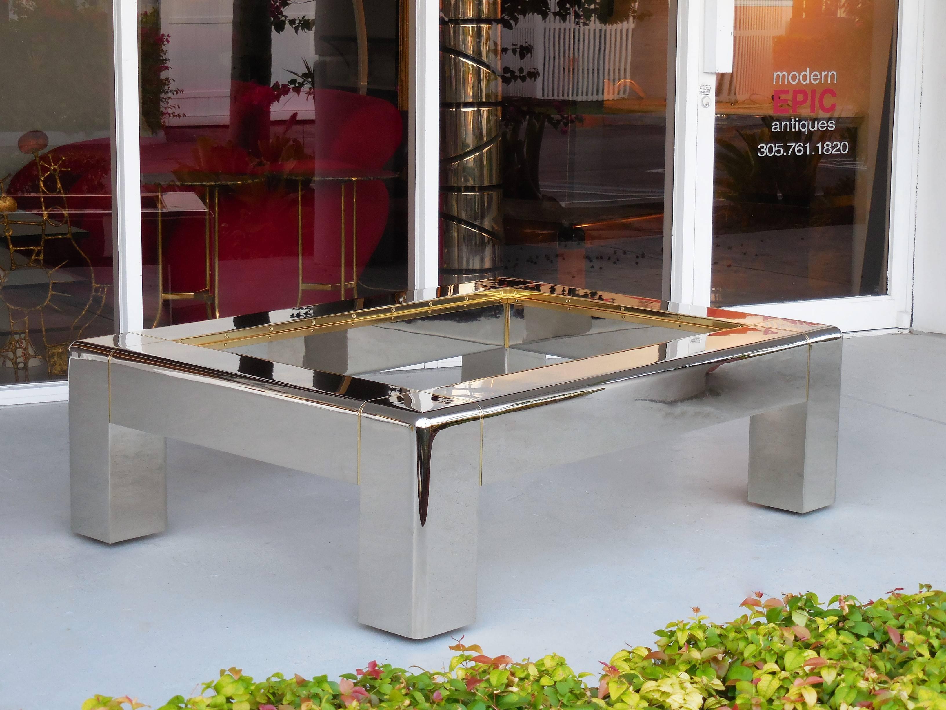 Superb coffee table by Karl Springer, nickel on bronze with polished bronze accents. Comes with new glass top (shown without glass top in pictures).