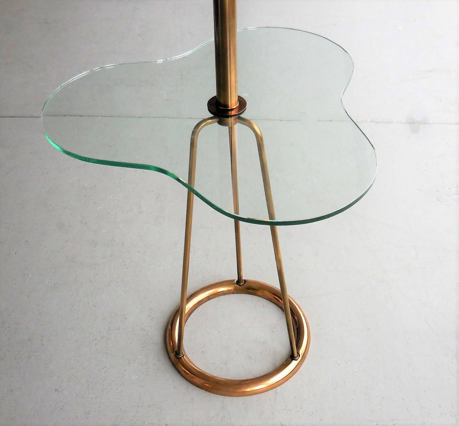 A Mid-Century floor lamp, bronze frame and free-form glass top. Retains period lampshade. Re-wired.