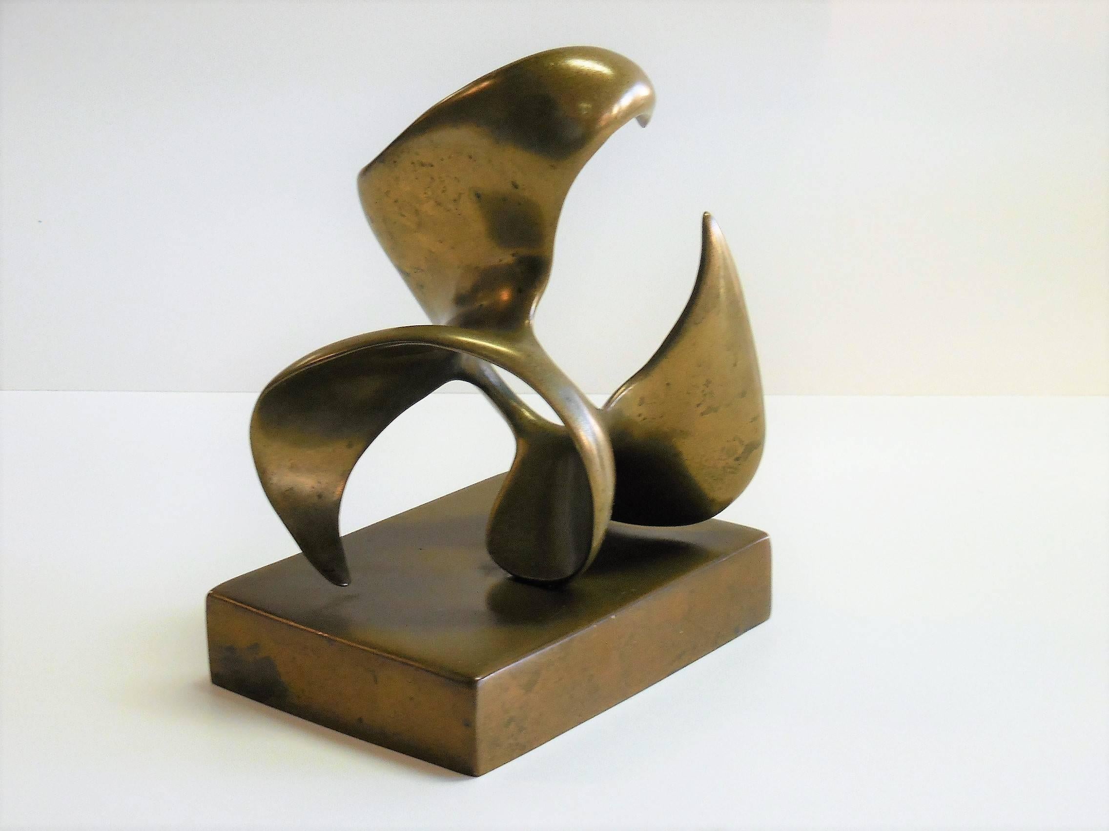 A bronze sculpture by Eli Karpel. Exciting form that can be appreciated from an angle. Retains natural patina. Signed and dated on base.