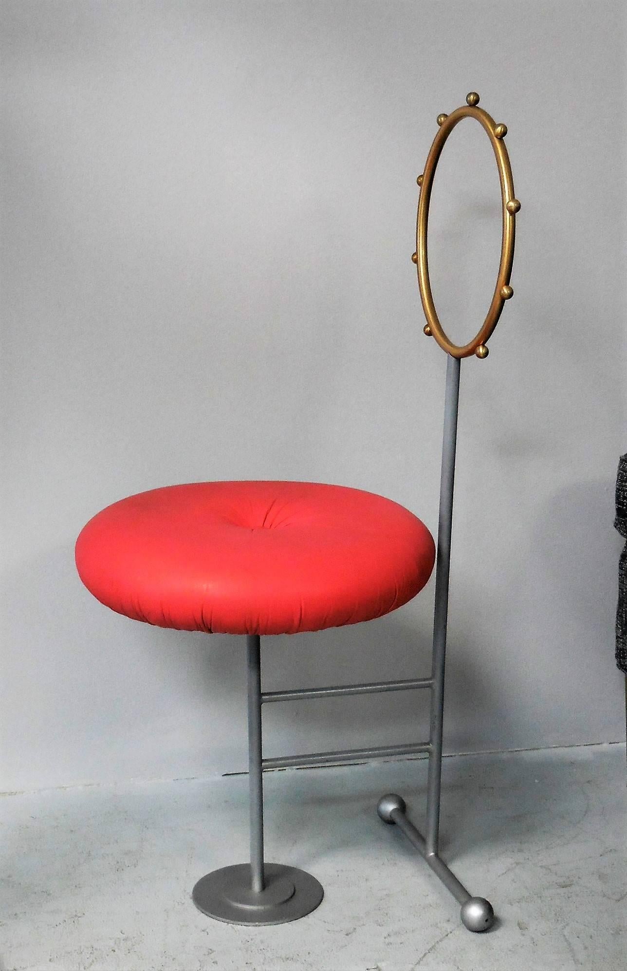 Most interesting chairs around. Brass halo backs rest on the unique enameled frames that also support the leather upholstered seats. Quite eye catching that add an unexpected edge to any room.