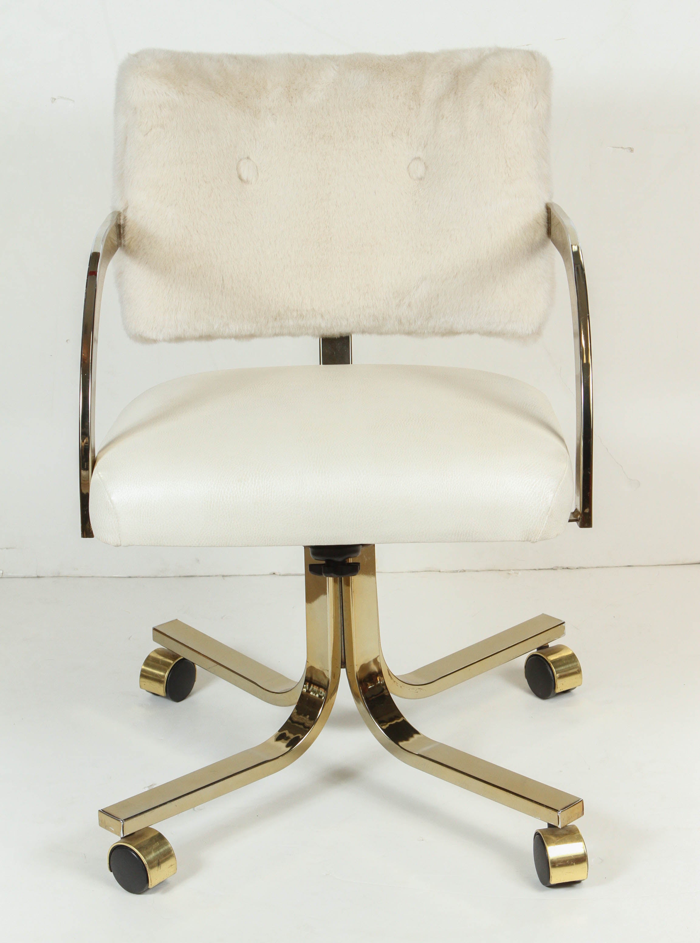 White Swivel Vinyl and Faux Fur Chair on Wheels For Sale