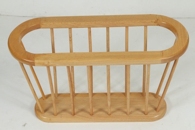 Natural wood magazine rack in the style of iconic Umanoff design, excellent modern spindle decor piece.