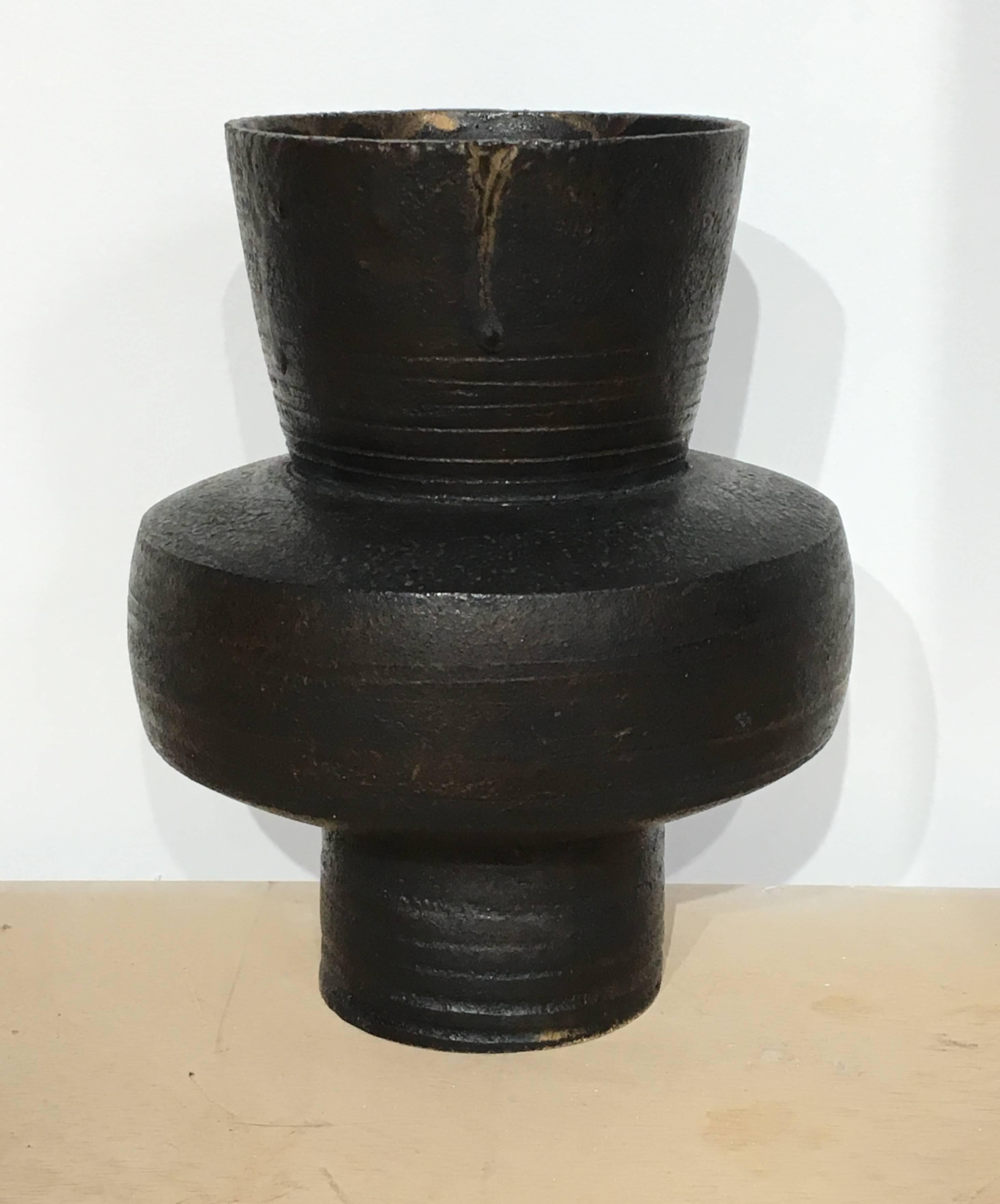Hans Coper was an influential German-born British studio potter. His work is often coupled with that of Lucie Rie due to their close association, even though their best known work differs dramatically, with Rie's being less sculptural, while Coper's