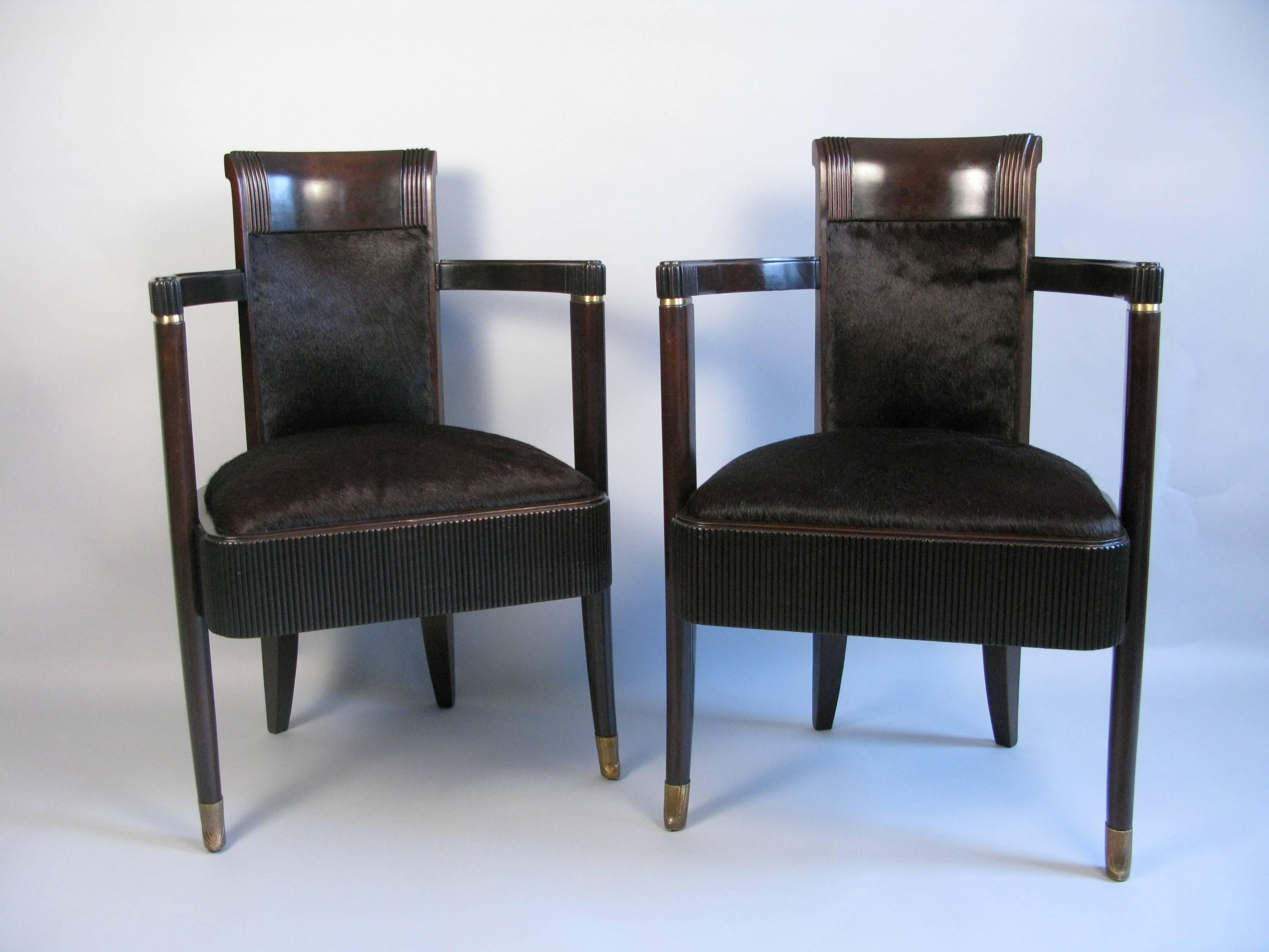 Meticulously restored pair of 1st class dining chairs from the French Luxury Liner S.S. Normandie (1935-1942). The luxury liner was the largest ever built. The ship was seized by the United States in 1942 and in the process of making it a troop