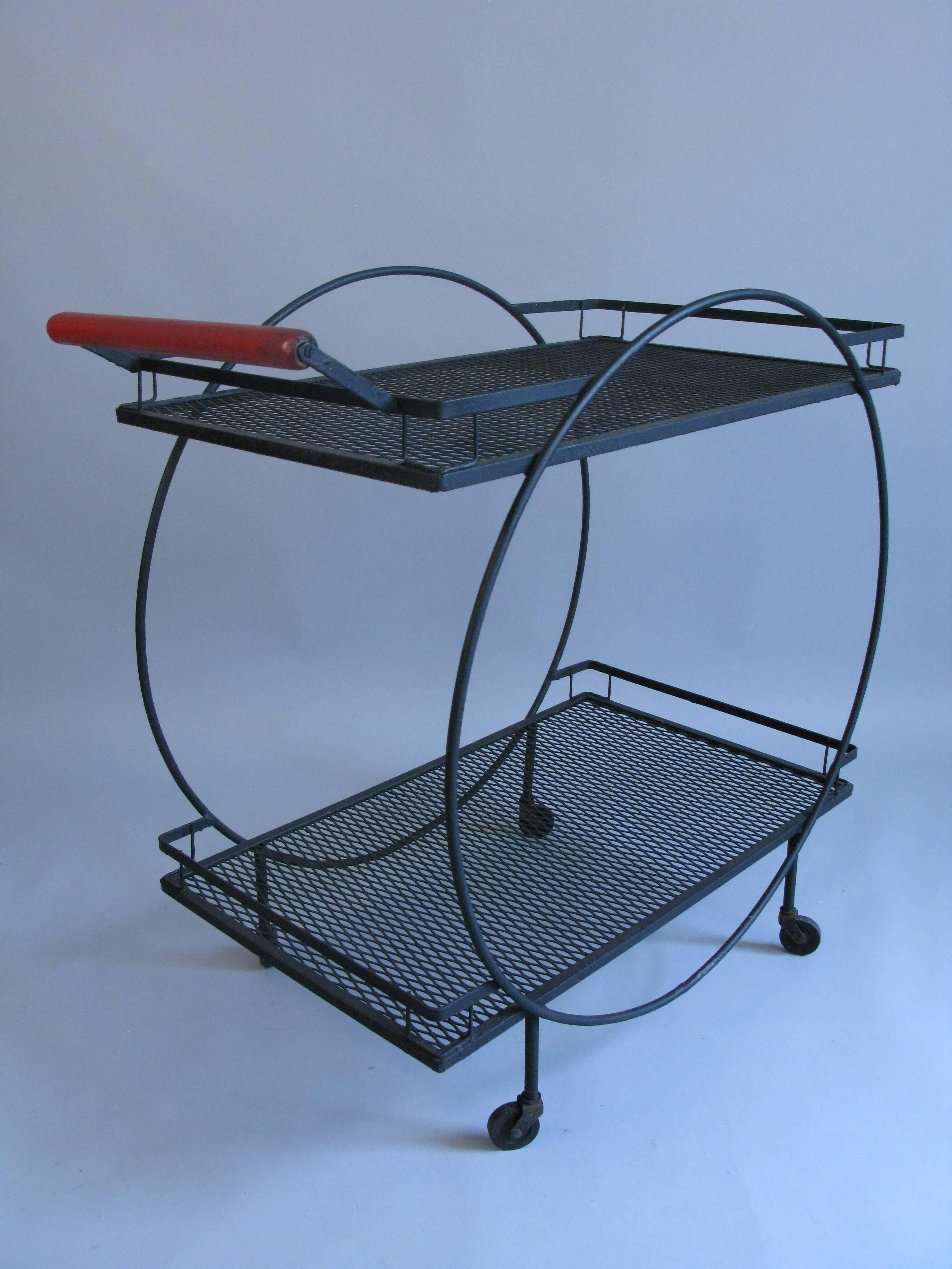 A very stylish 1950s wrought iron serving or bar cart.
