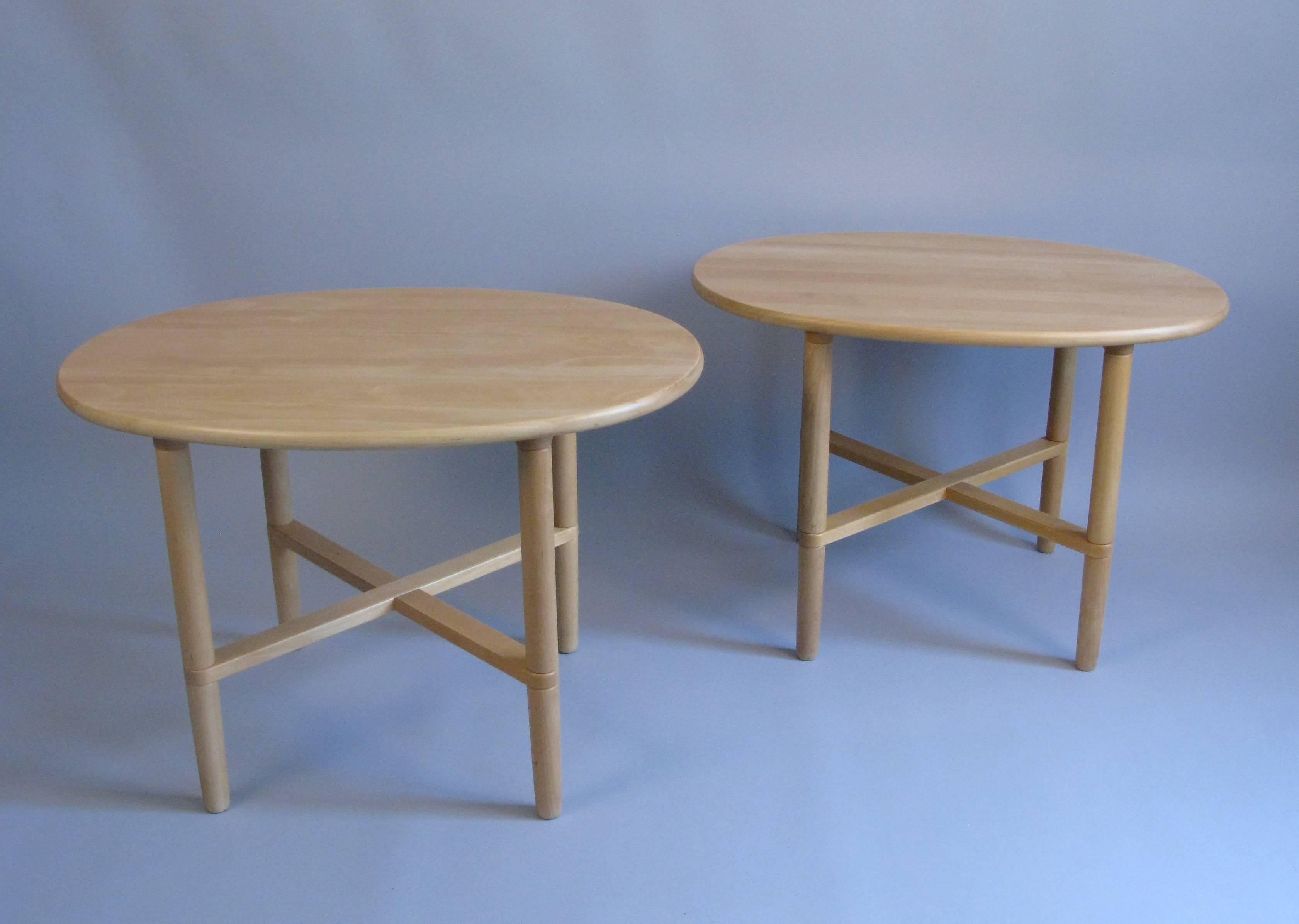 A nice looking pair of oval later 20th century Danish handmade tables by Haslev.