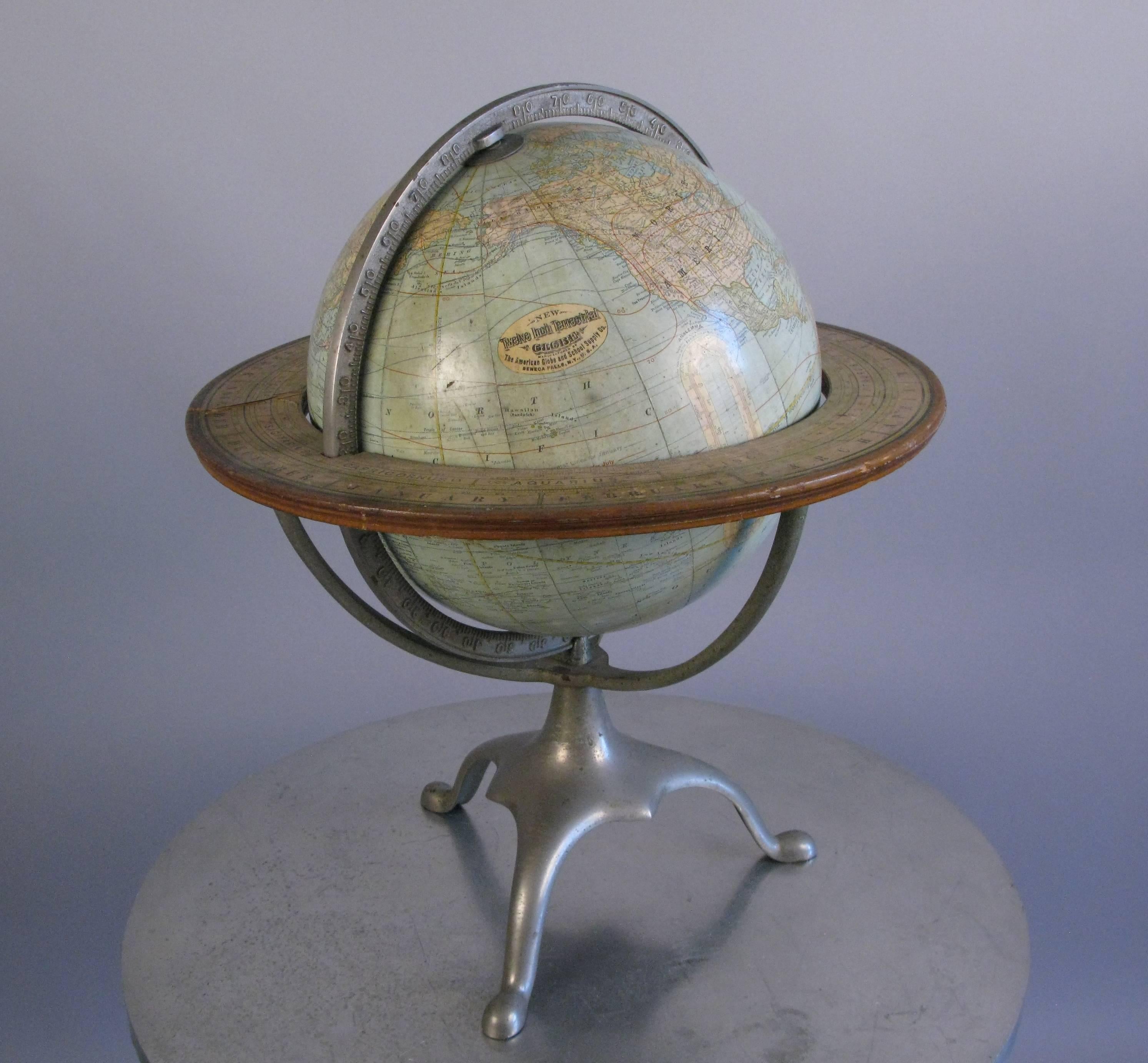 A somewhat rare world globe from 1890s-1900s made by the American Globe and School Supply Co. Seneca Falls, NY. The globe is in very good condition with some wear and the frame is nickel-plated.