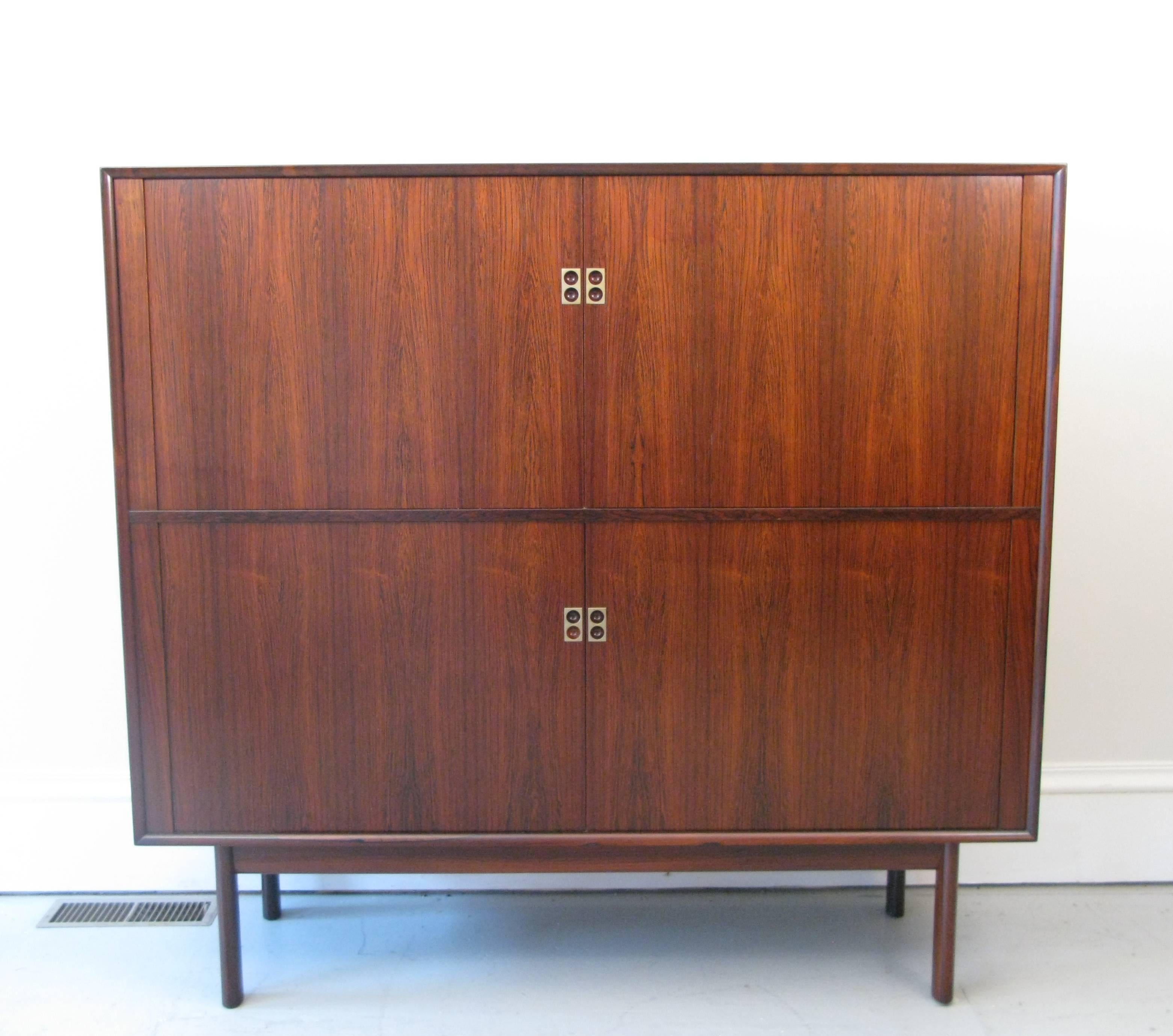 Pair of 1950s Danish rosewood cabinets by Arne Vodder for Sibast. The cabinets have been restored to beautiful condition. Label is on the underside.