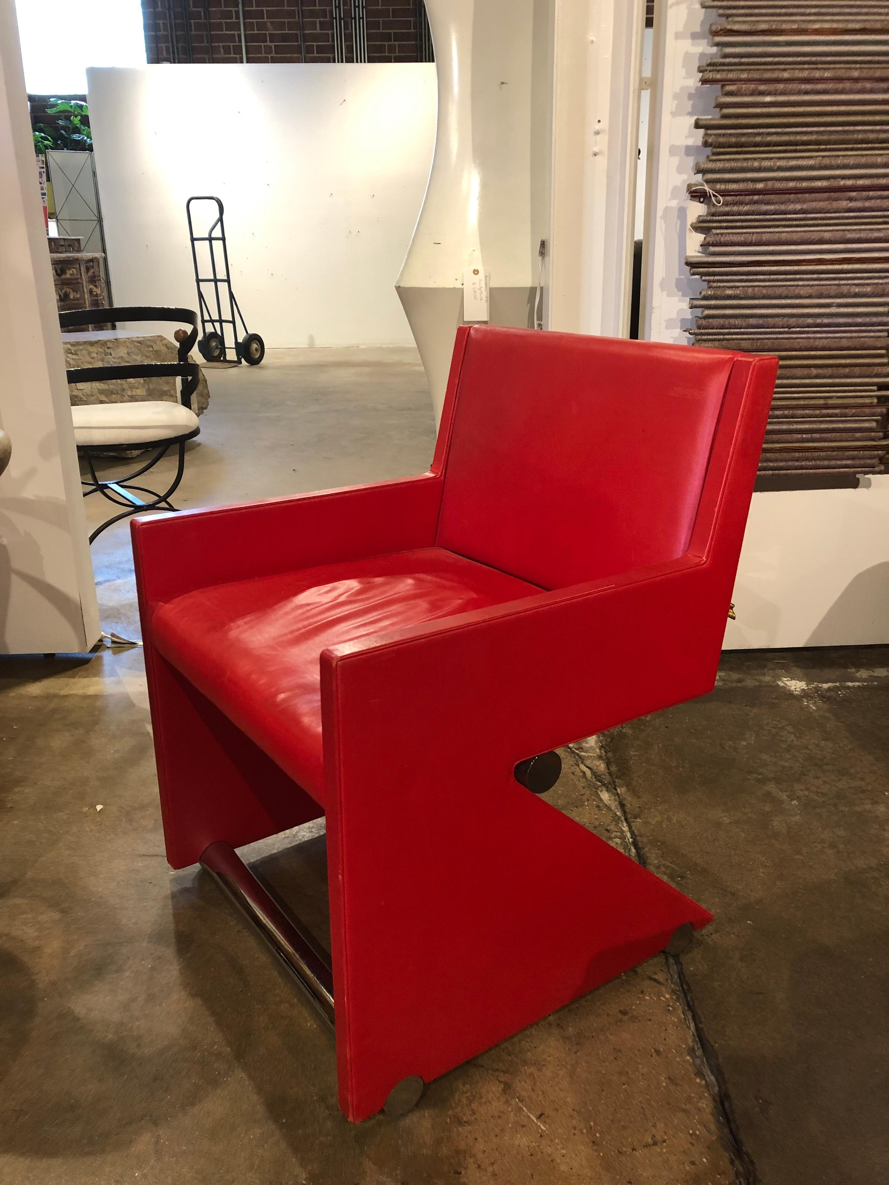 Modern leather and chrome desk/accent chair. Measures: Arm H 22.25”.