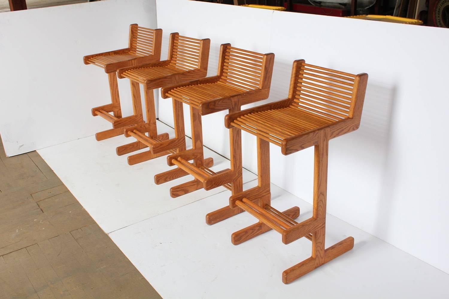 Stylish midcentury wood bar stools.