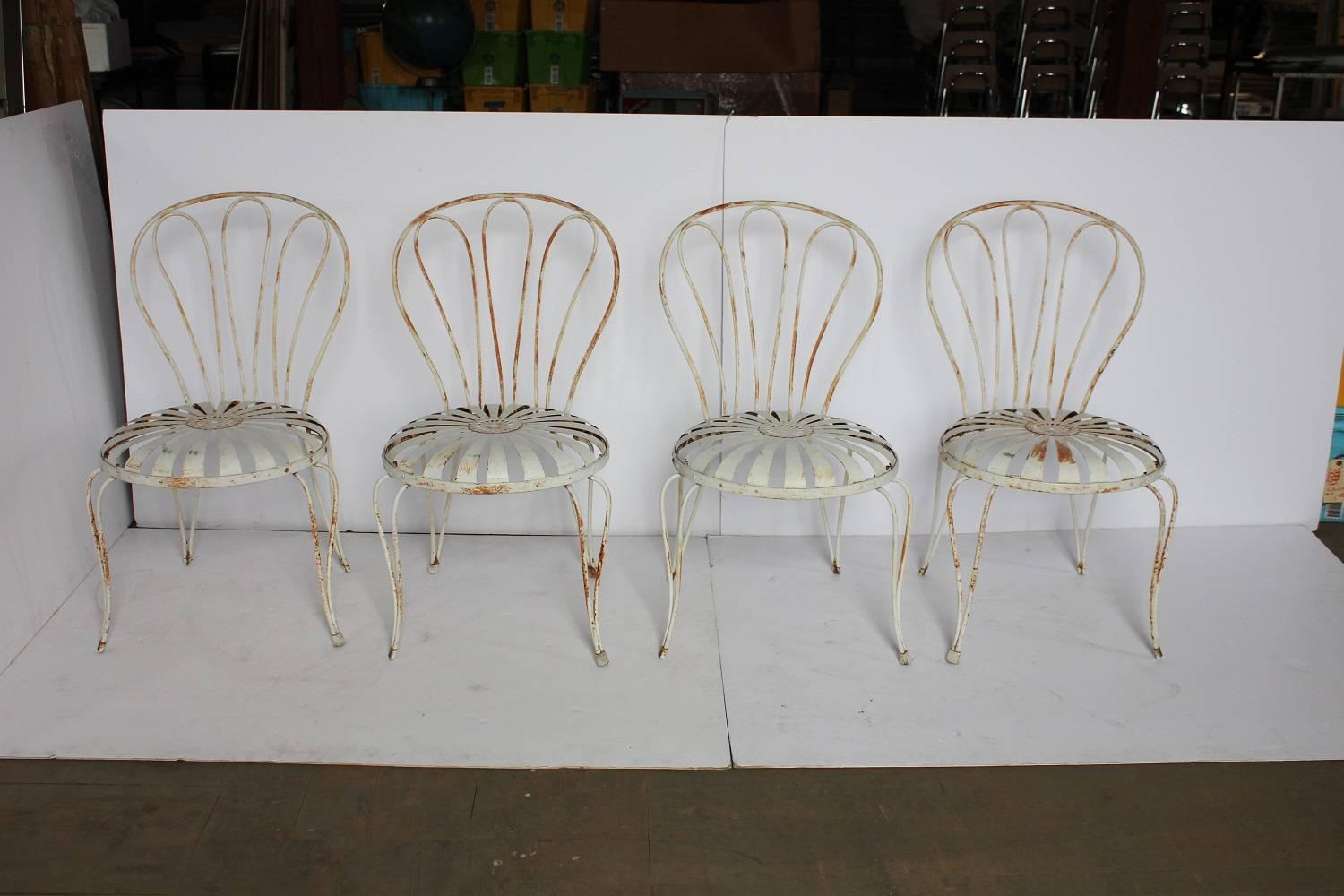 1930s French sunburst garden chairs By Francois Carre.