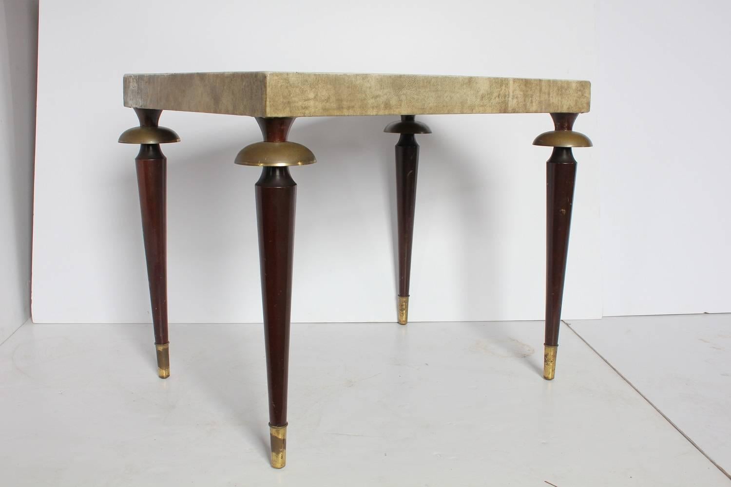 Stylish Mid-Century leather top accent table.