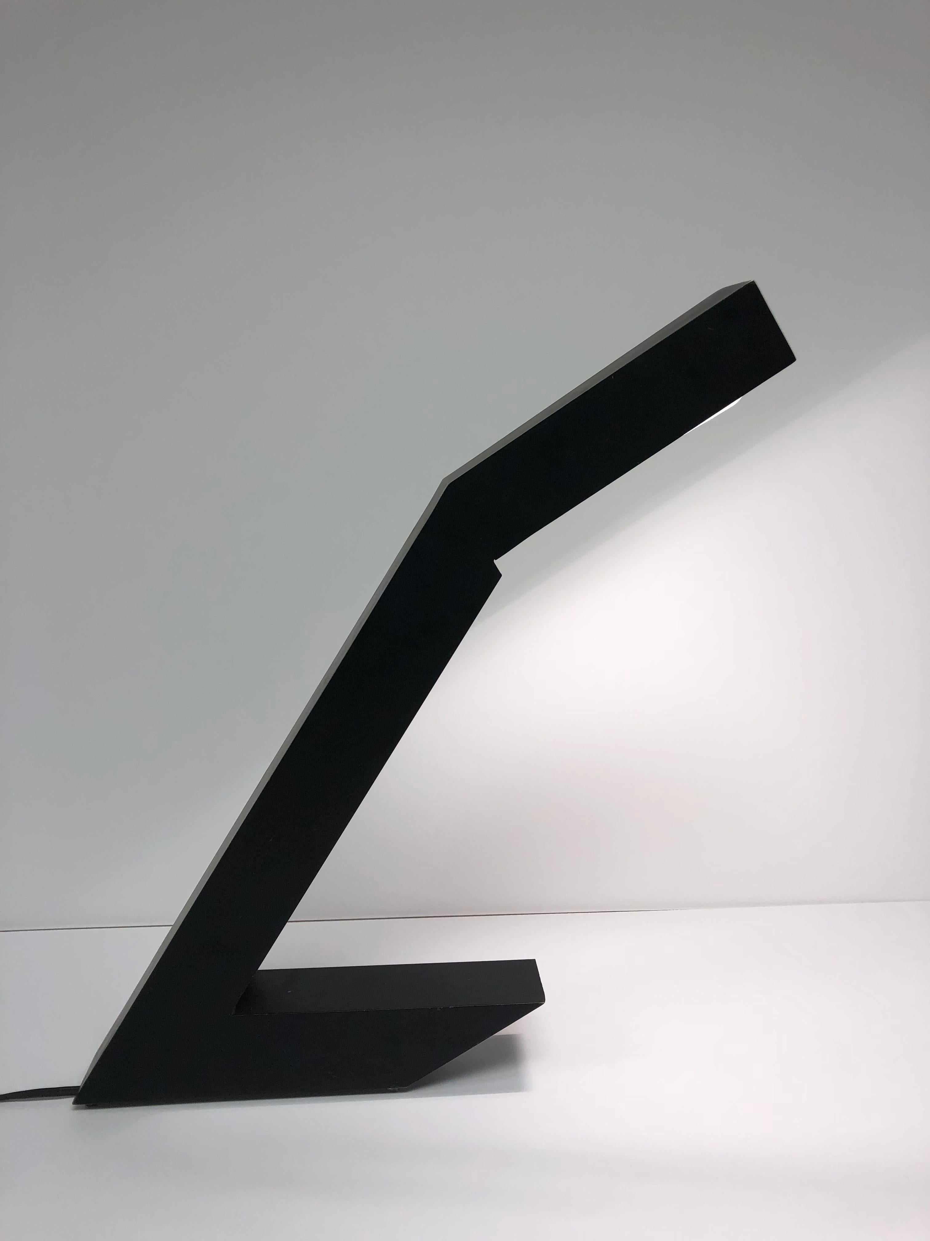 Modern origami bronze desk lamp.