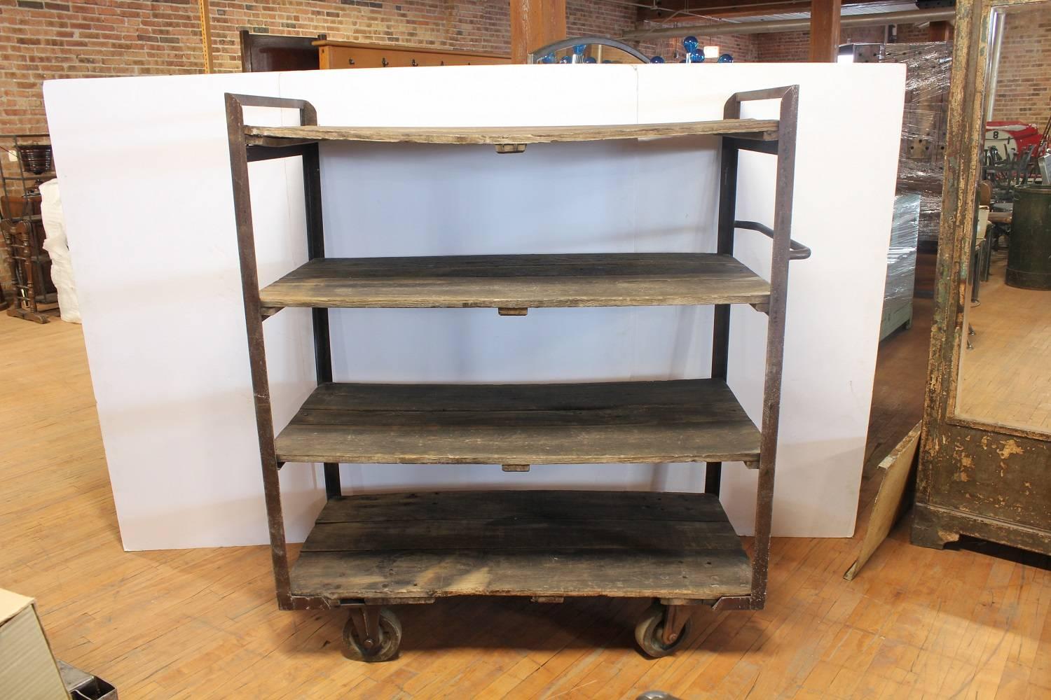 Antique Industrial shelves with metal base and wood shelves.