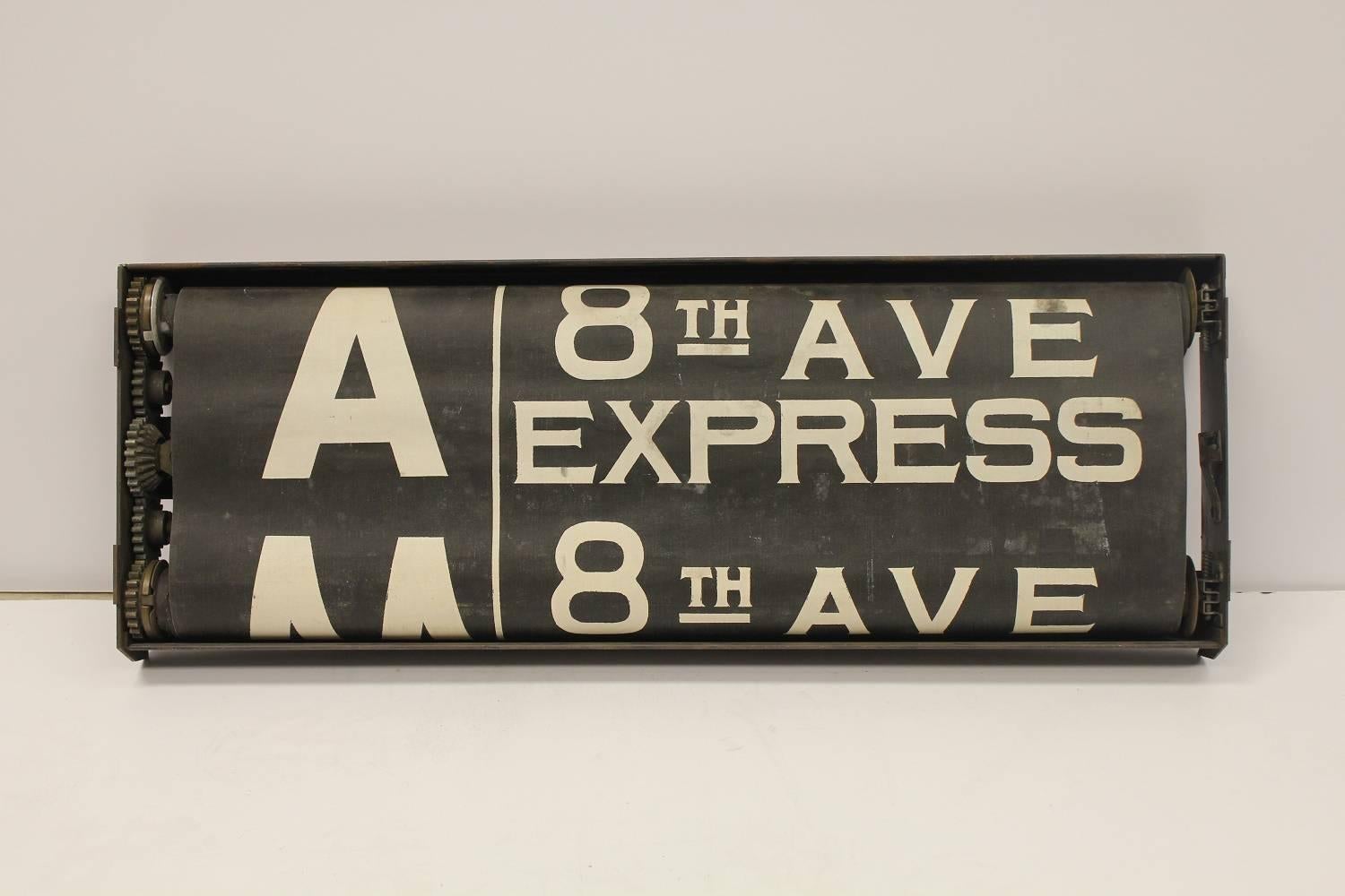 Early 20th century New York City train schedule sign with original metal frame.