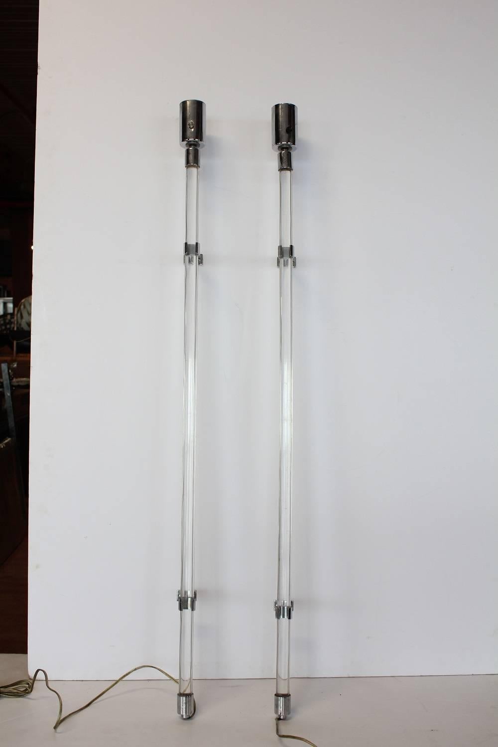 Stylish modern Lucite and chrome wall sconces by Charles Hollis Jones.