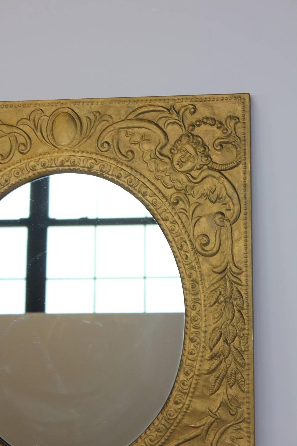 Antique tin framed mirror.