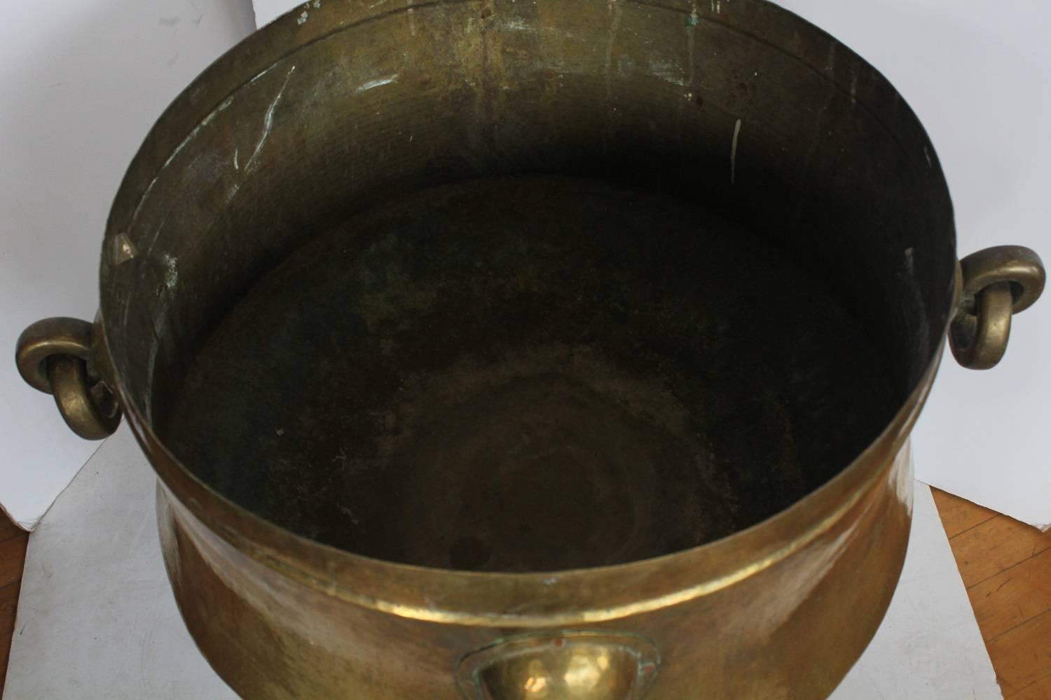 Giant Antique Decorative Brass Footed Cauldron With Handles For Sale at