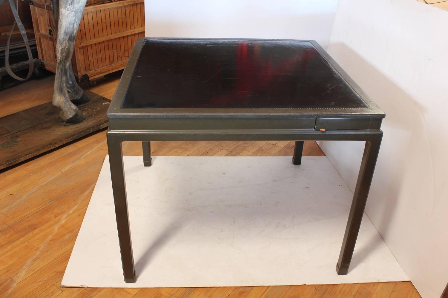 Mid-Century leather top game table by Dunbar.