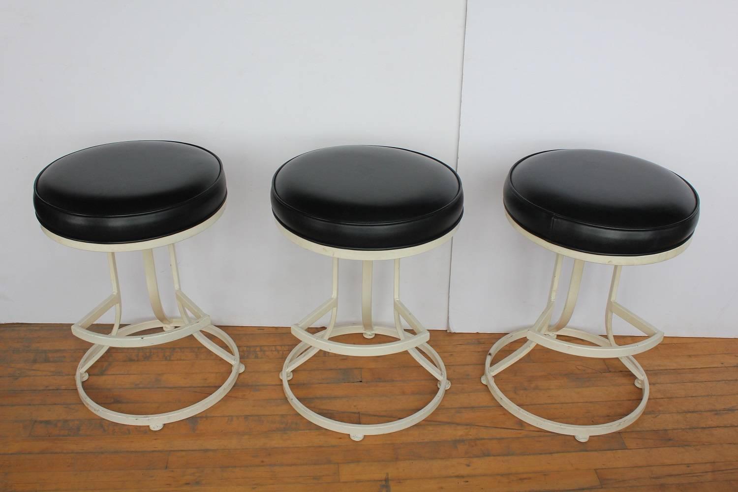 Mid-Century Swivel Stools By Shaver Howard. Listed price is for each stool.