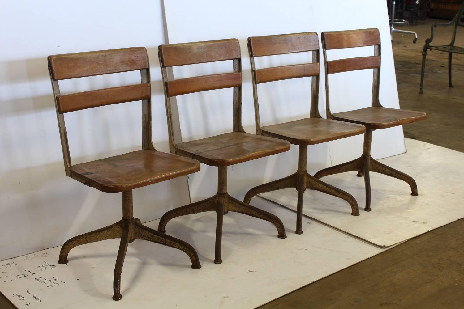 1930s American school chair. Metal base with wood seat and back. More available. Listed price for each chair.