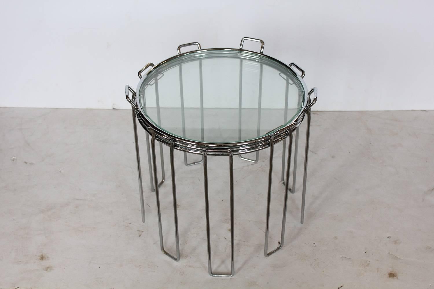 Modern chrome and glass nesting tables by Saporiti.