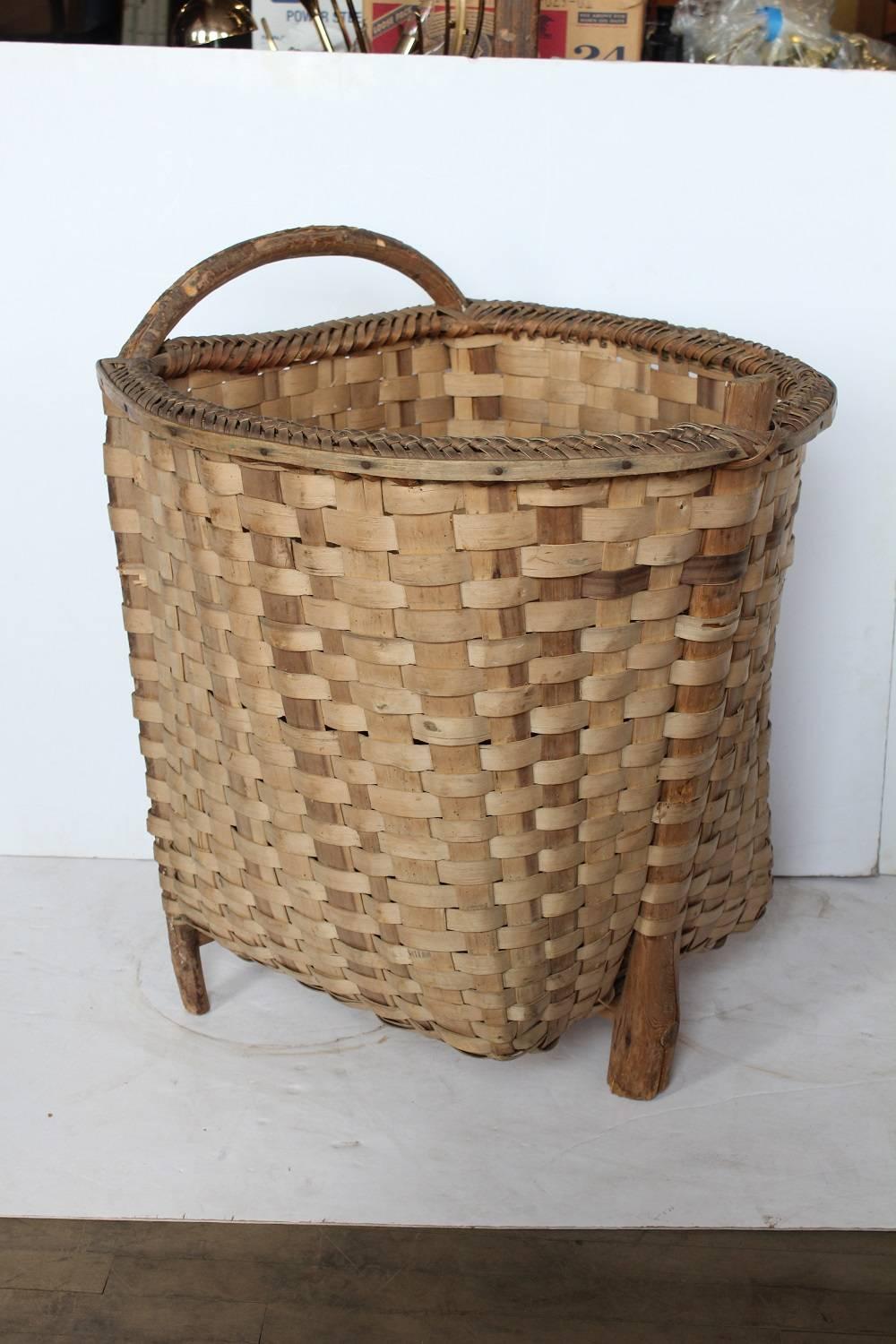 Large French footed grape basket.