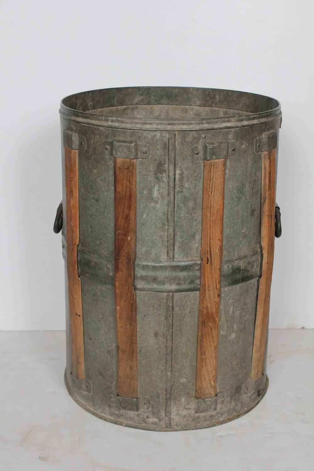 Antique rustic metal bucket.