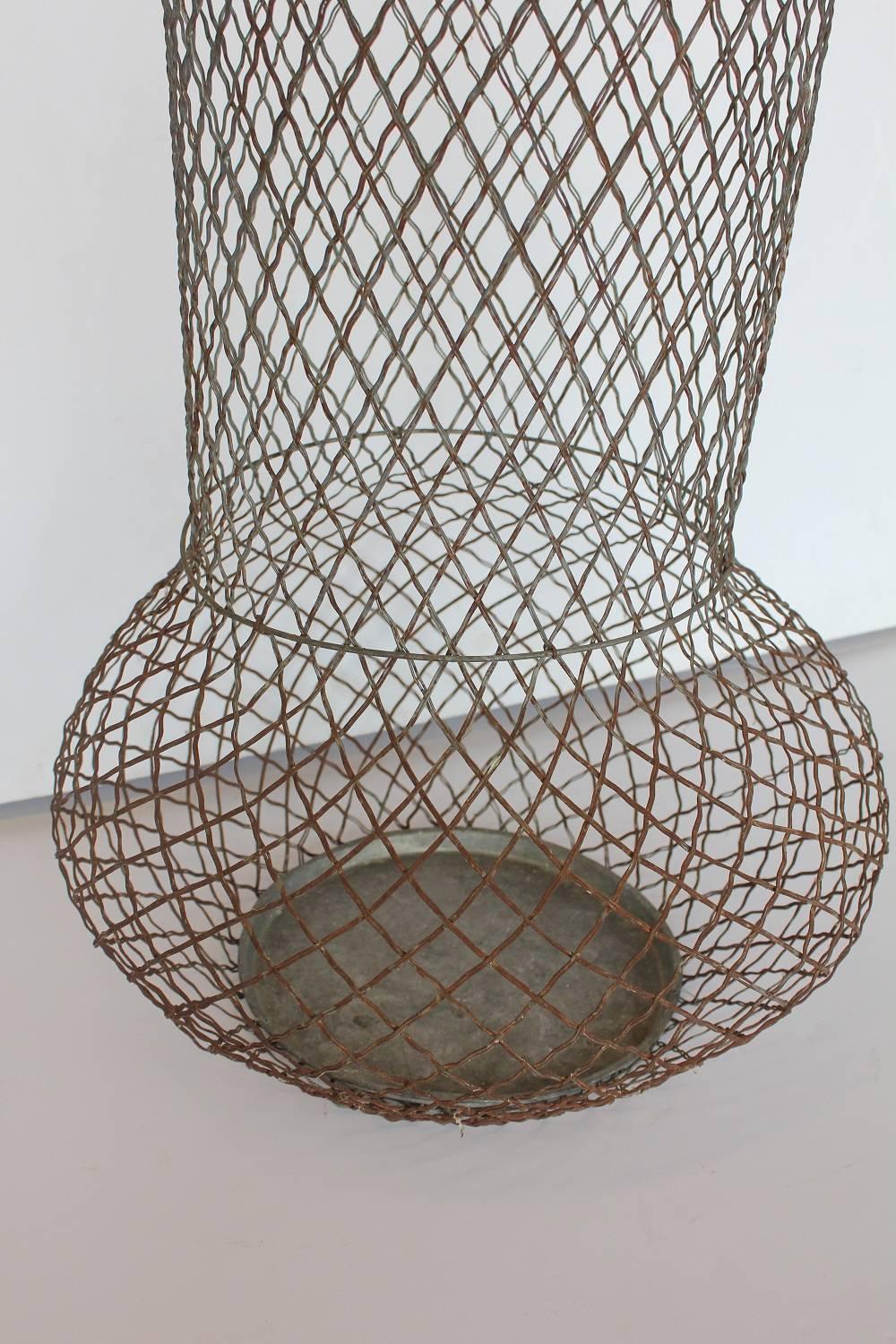 Early 1900s tall American wire urn or waste basket.