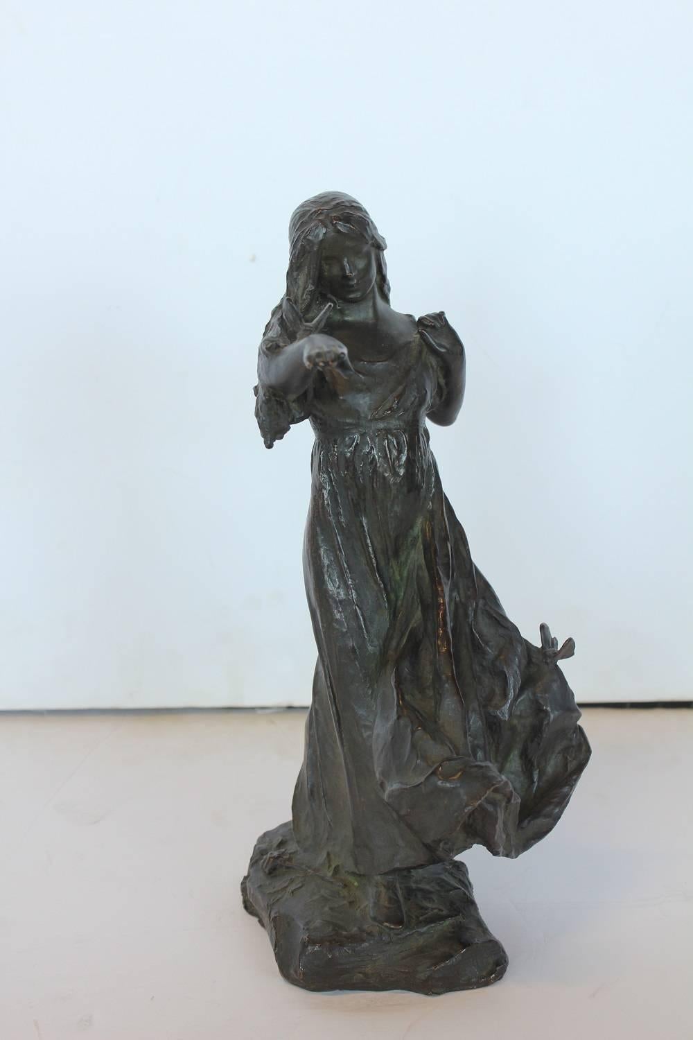 Antique Bronze Figurine By Bessie Potter Vonnoh 1872-1955. It is signed. A Saint Louis native, Bessie Onahotema Potter Vonnoh produced genre statuettes depicting domestic and feminine subjects that not only captured a refined segment of