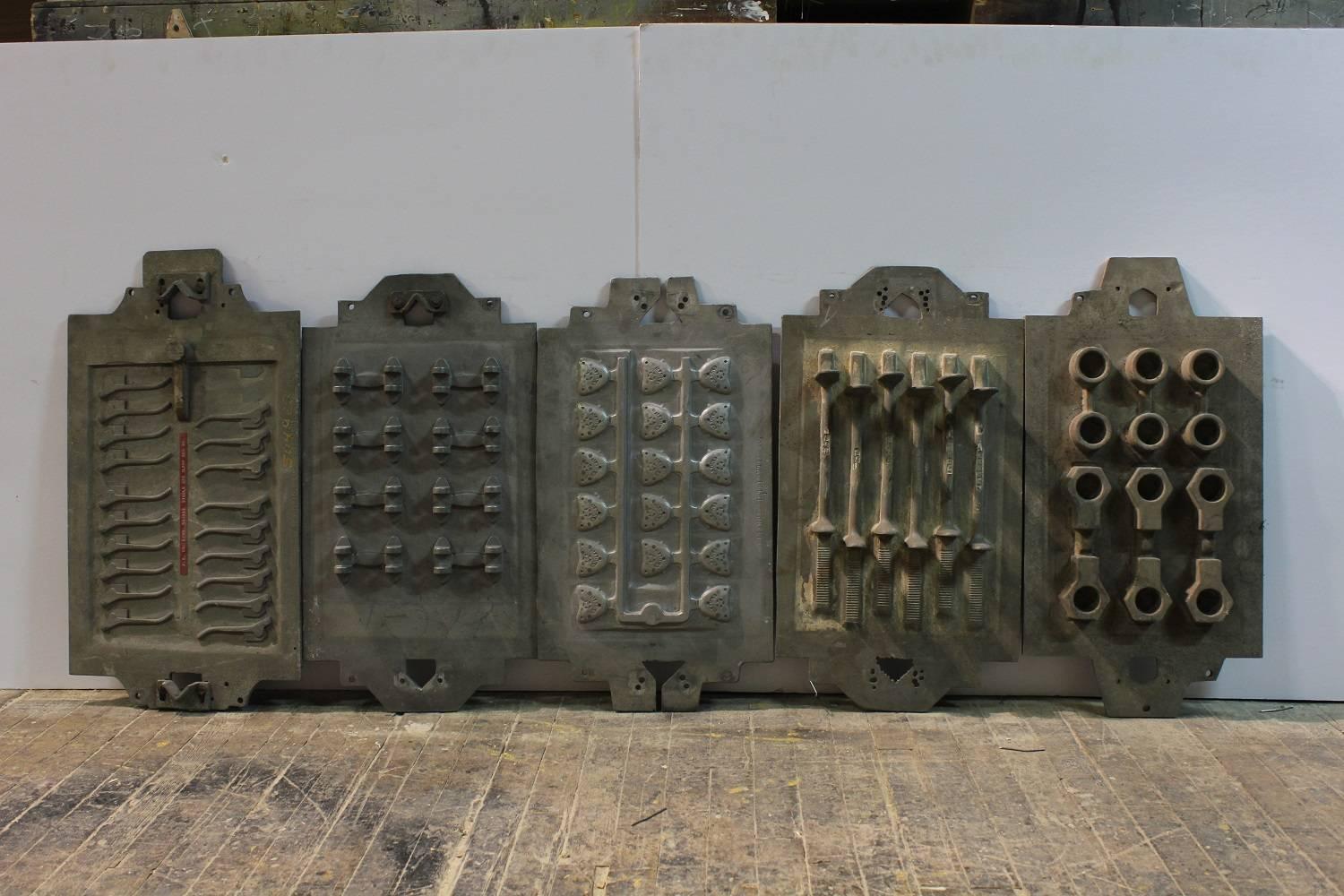 Collection Of five large antique Industrial metal molds.