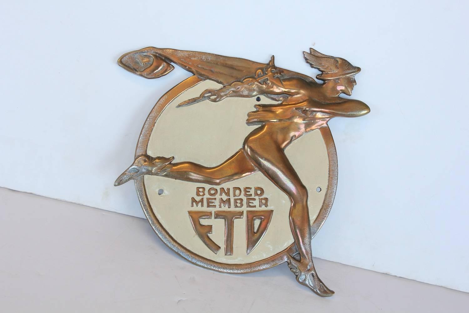 1930s American FTD truck medallion.