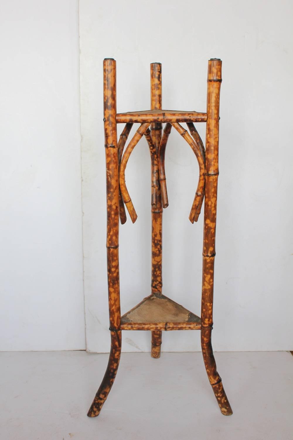 Victorian tortoise shell bamboo stand or pedestal with brass decorations. Measures: Top W 13.25