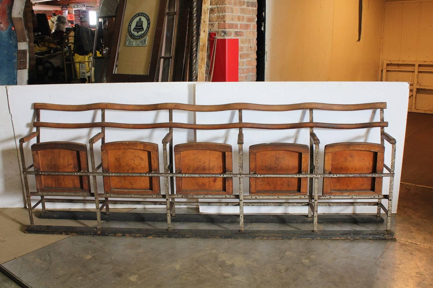 Antique theater five-seat folding bench.