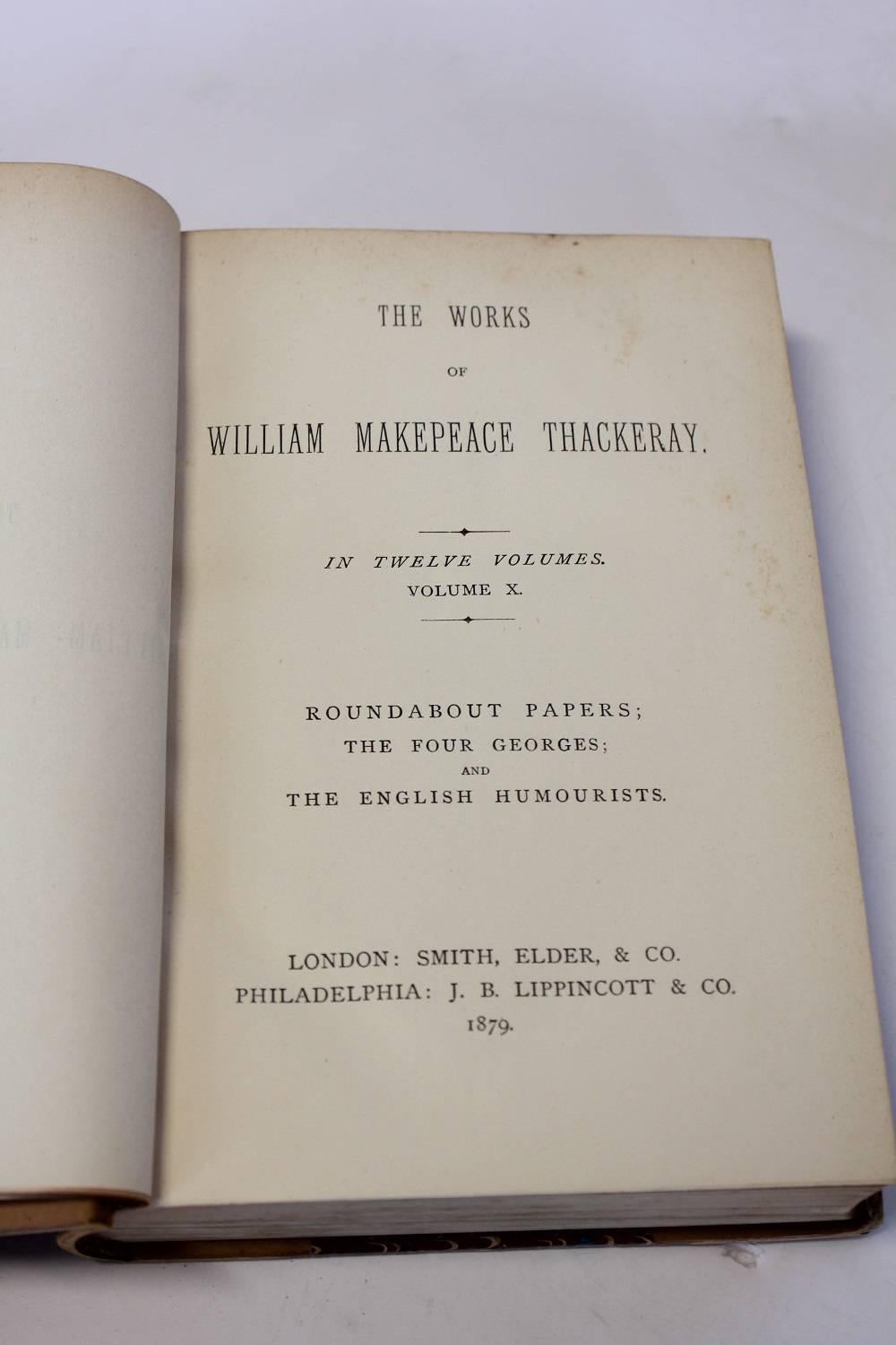 Collection of ten leather volumes of the works of William Makepeace Thackeray. Printed in 1879 by Smith, Elder & Co.