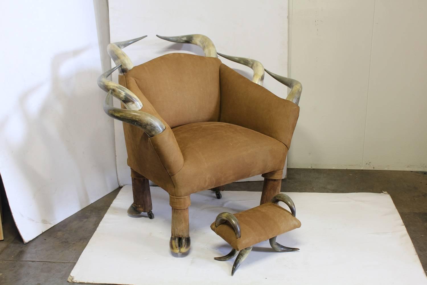 Spectacular Antique Horn and Suede Lounge Chair and Ottoman. New suede upholstery. Stool: H 10, W 14.25", D 8.25"