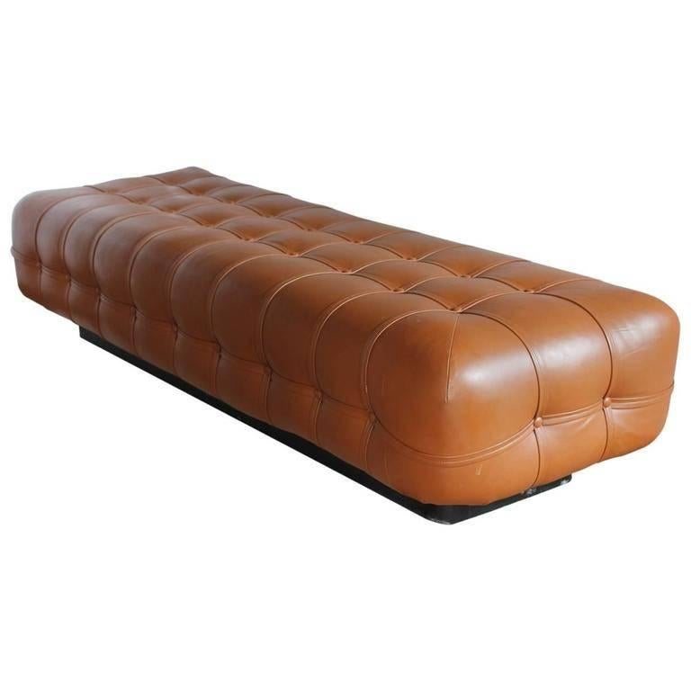 Stylish Midcentury tufted leather floating bench by Nicos Zographos.